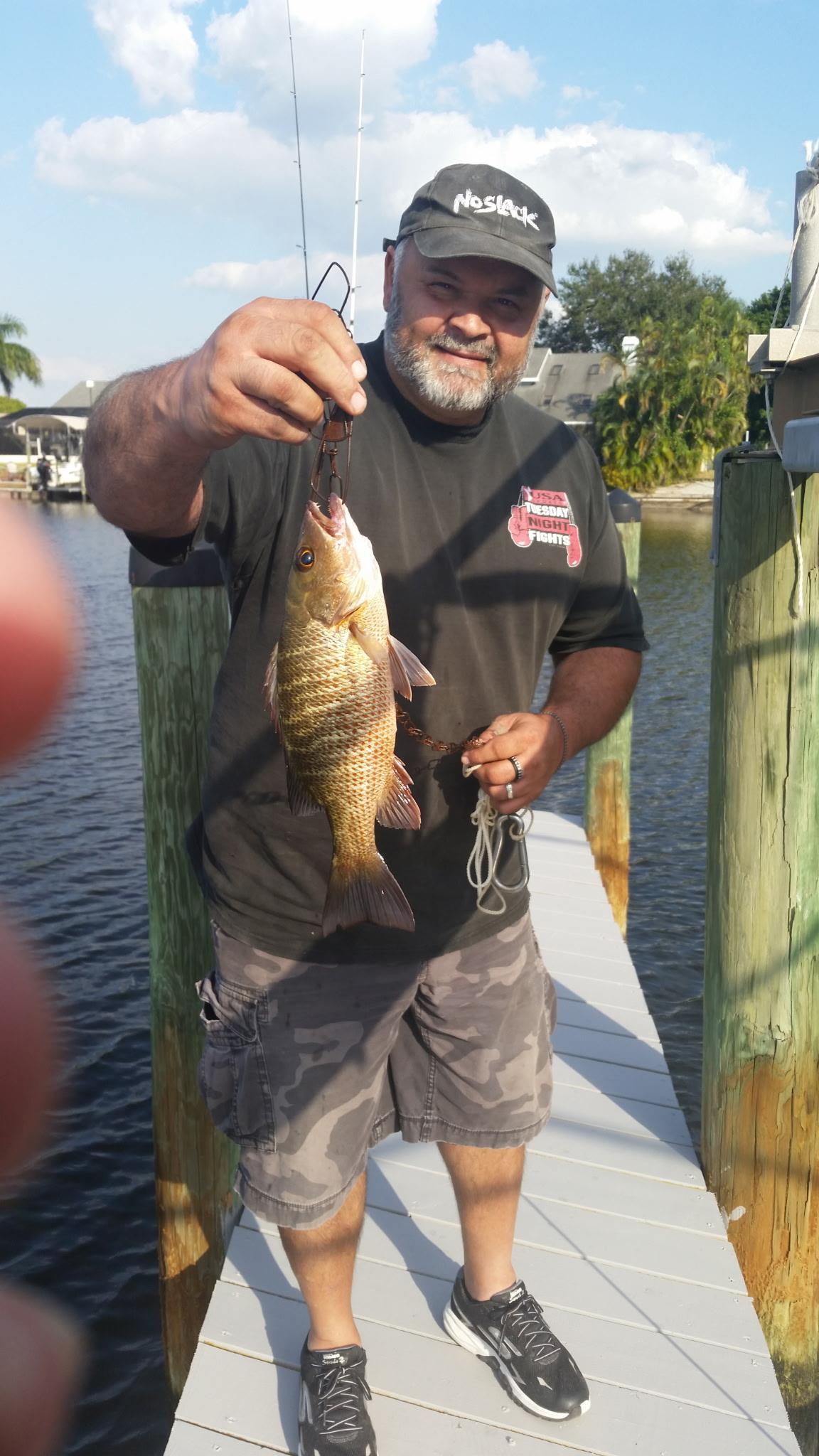 A man holding a fish