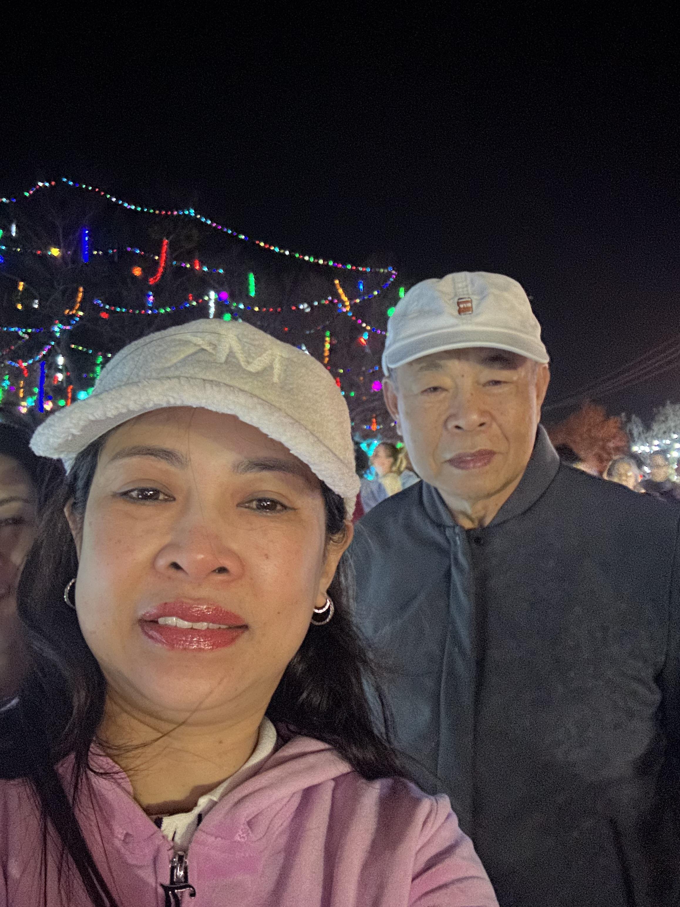 A woman and man taking a selfie