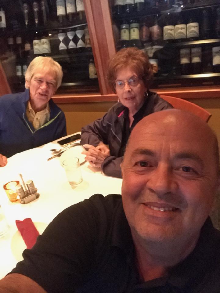 A group of people sitting at a table