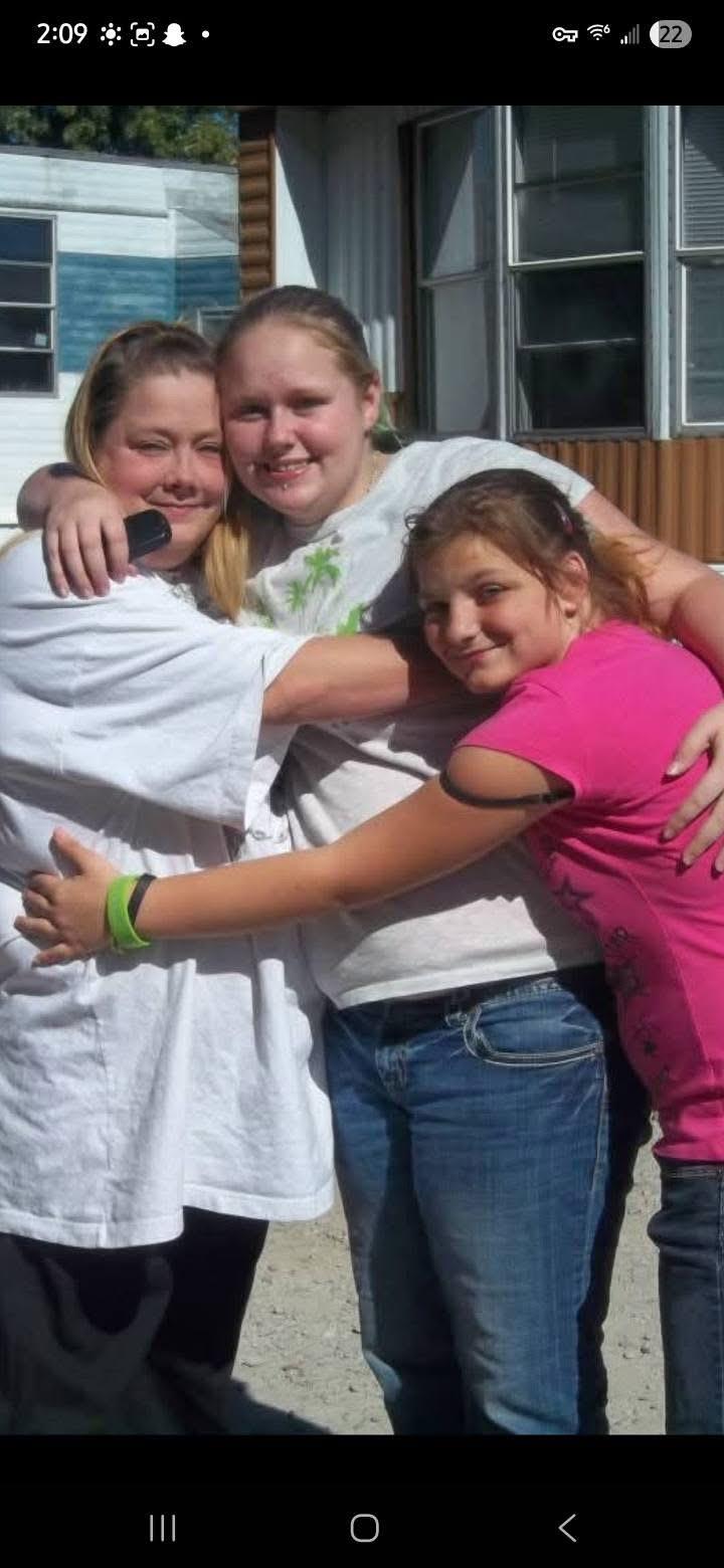 A group of people hugging