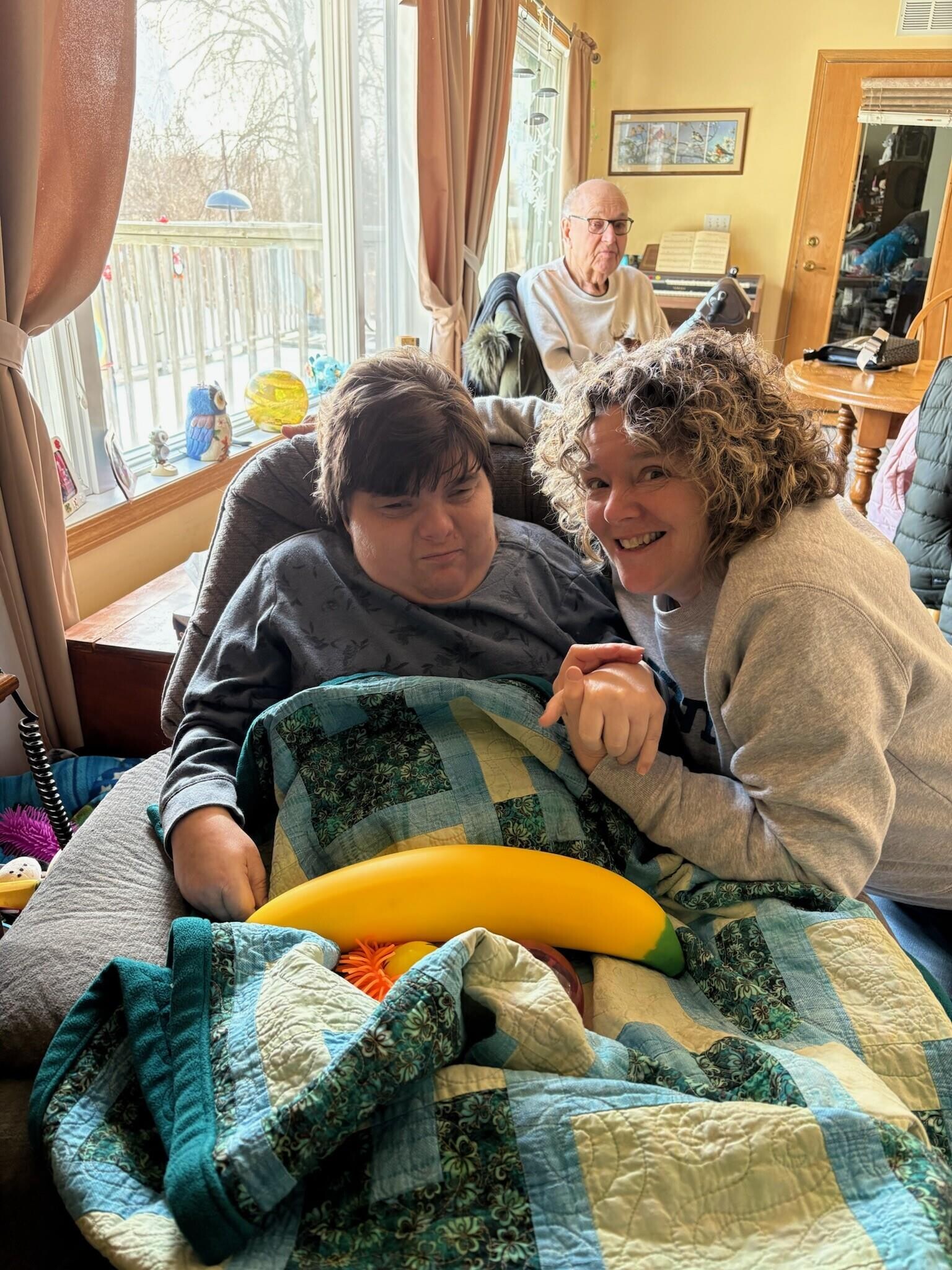 A man and woman sitting on a couch