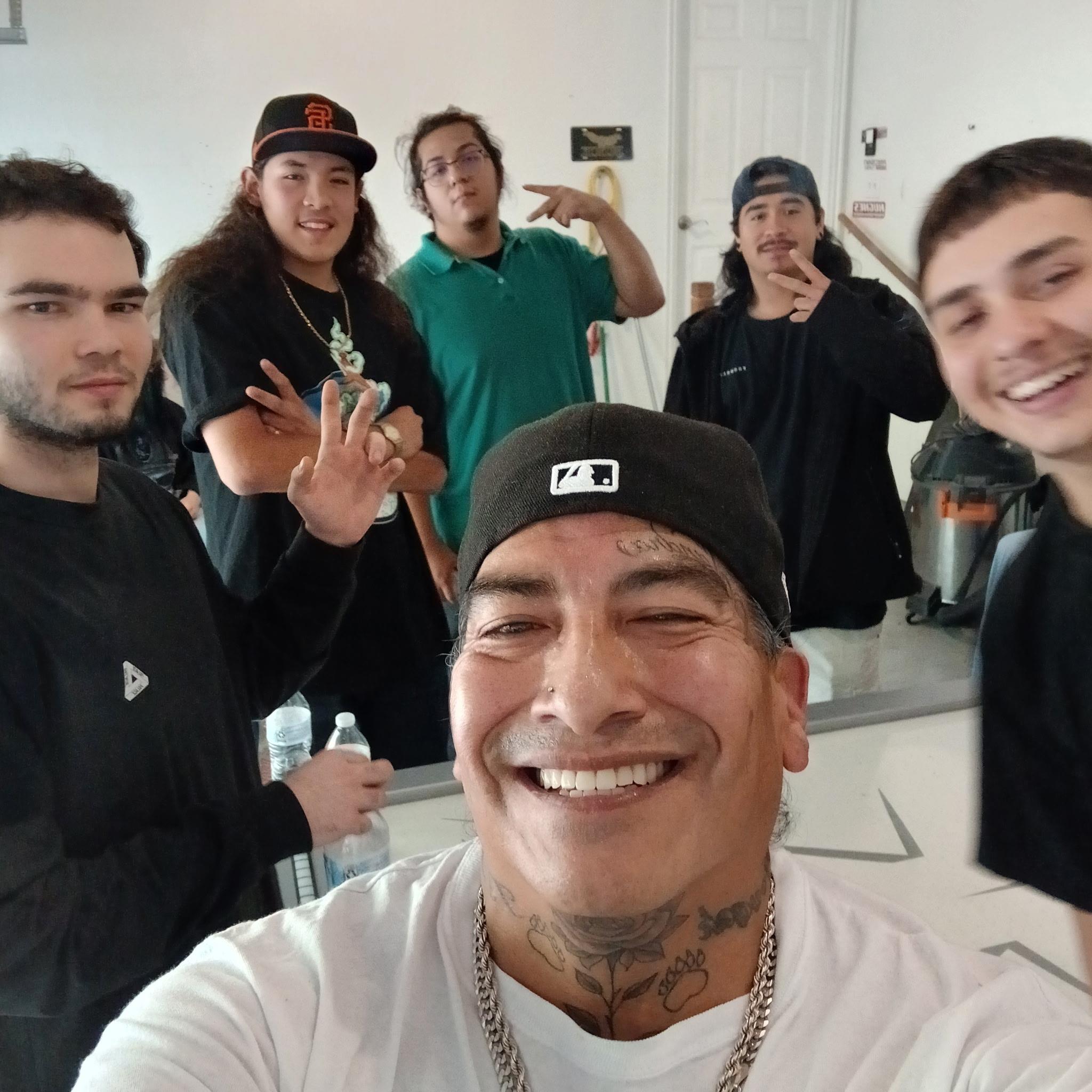 A group of people posing for a selfie