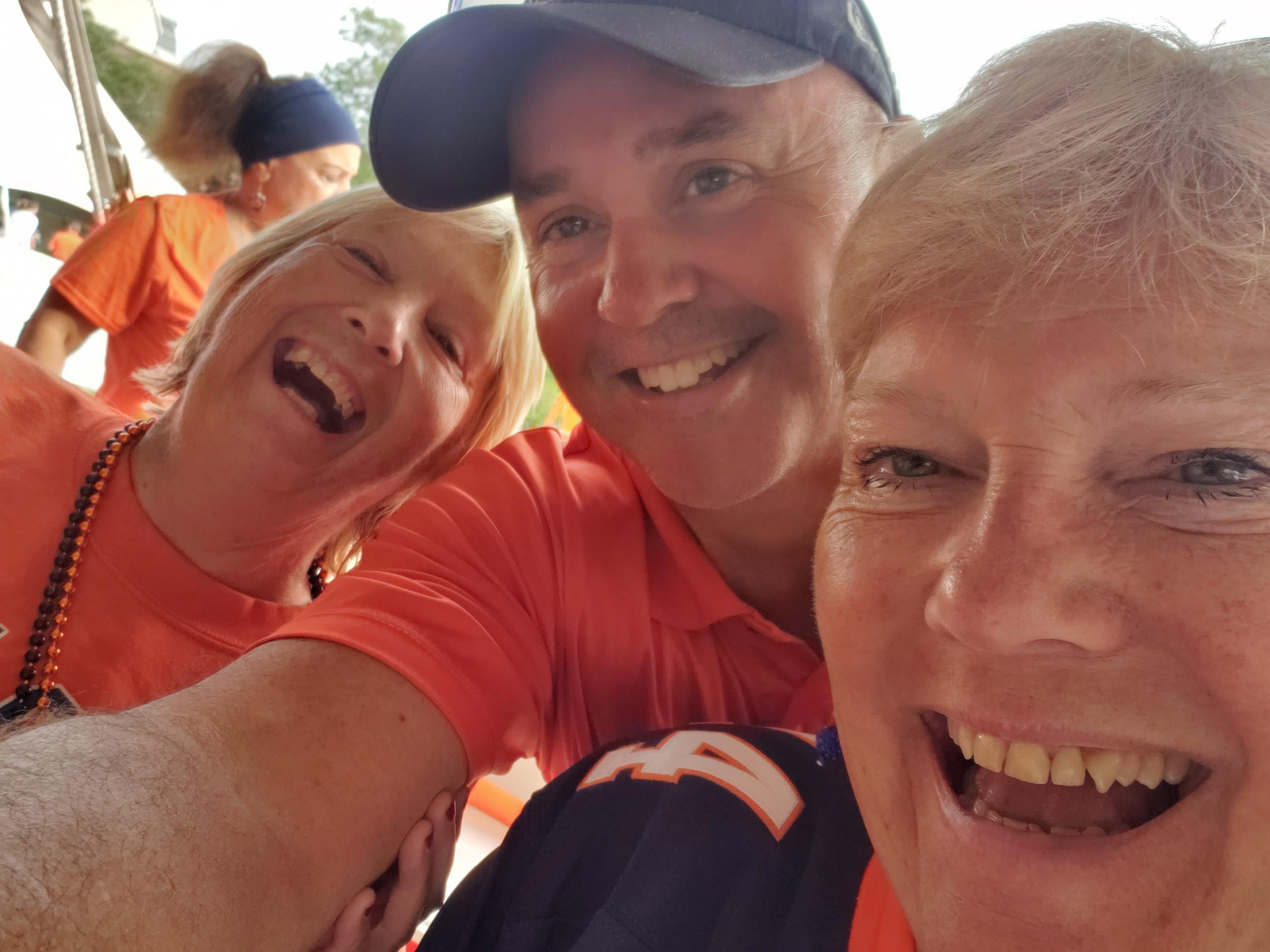 A group of people taking a selfie