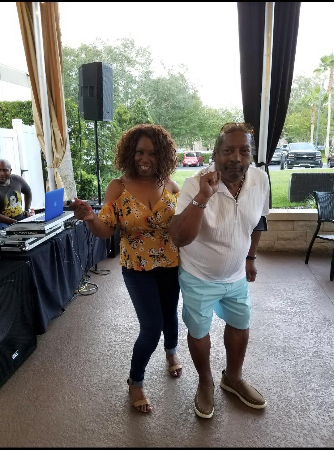 A man and woman posing for a picture