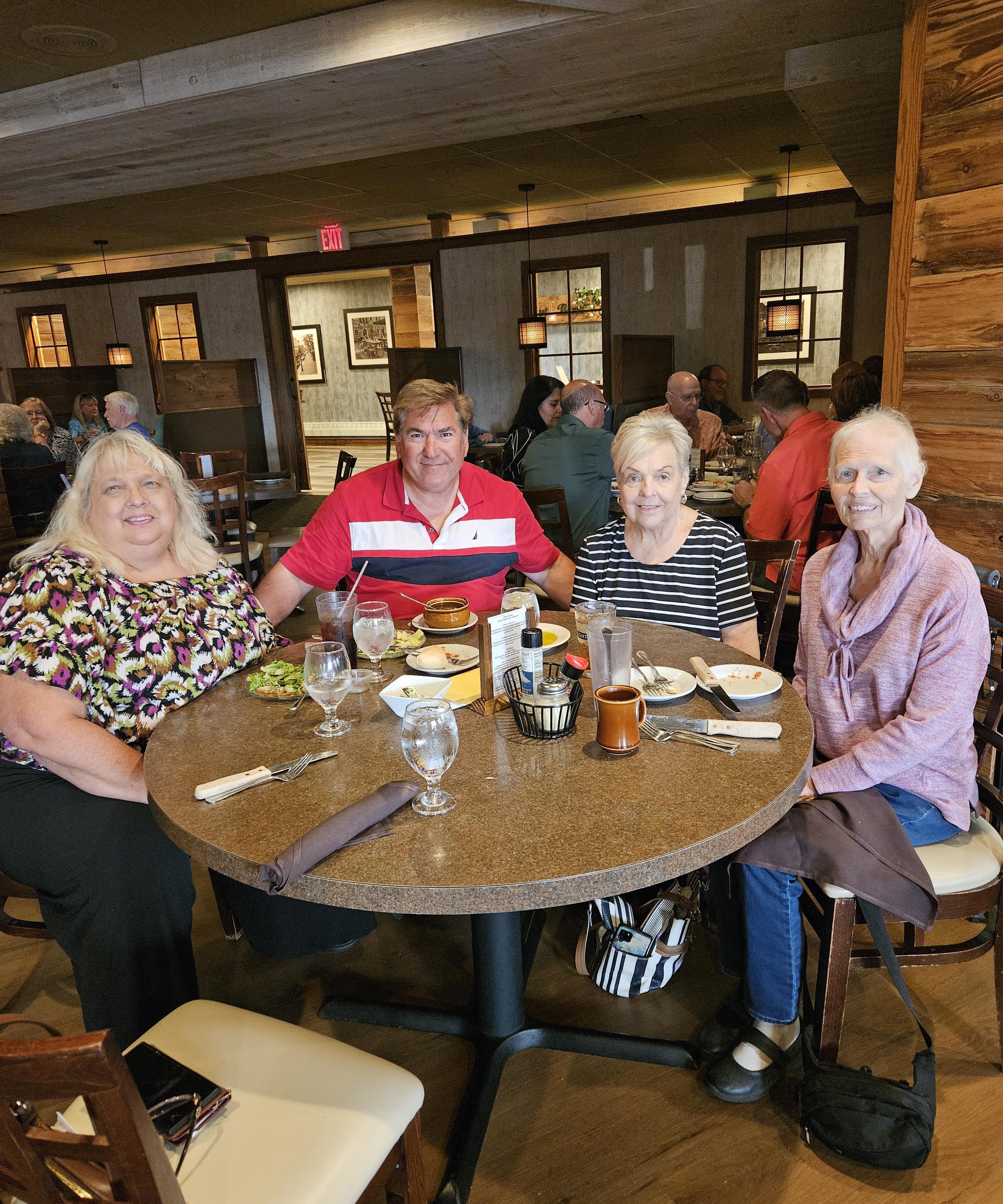 A group of people sitting at a table