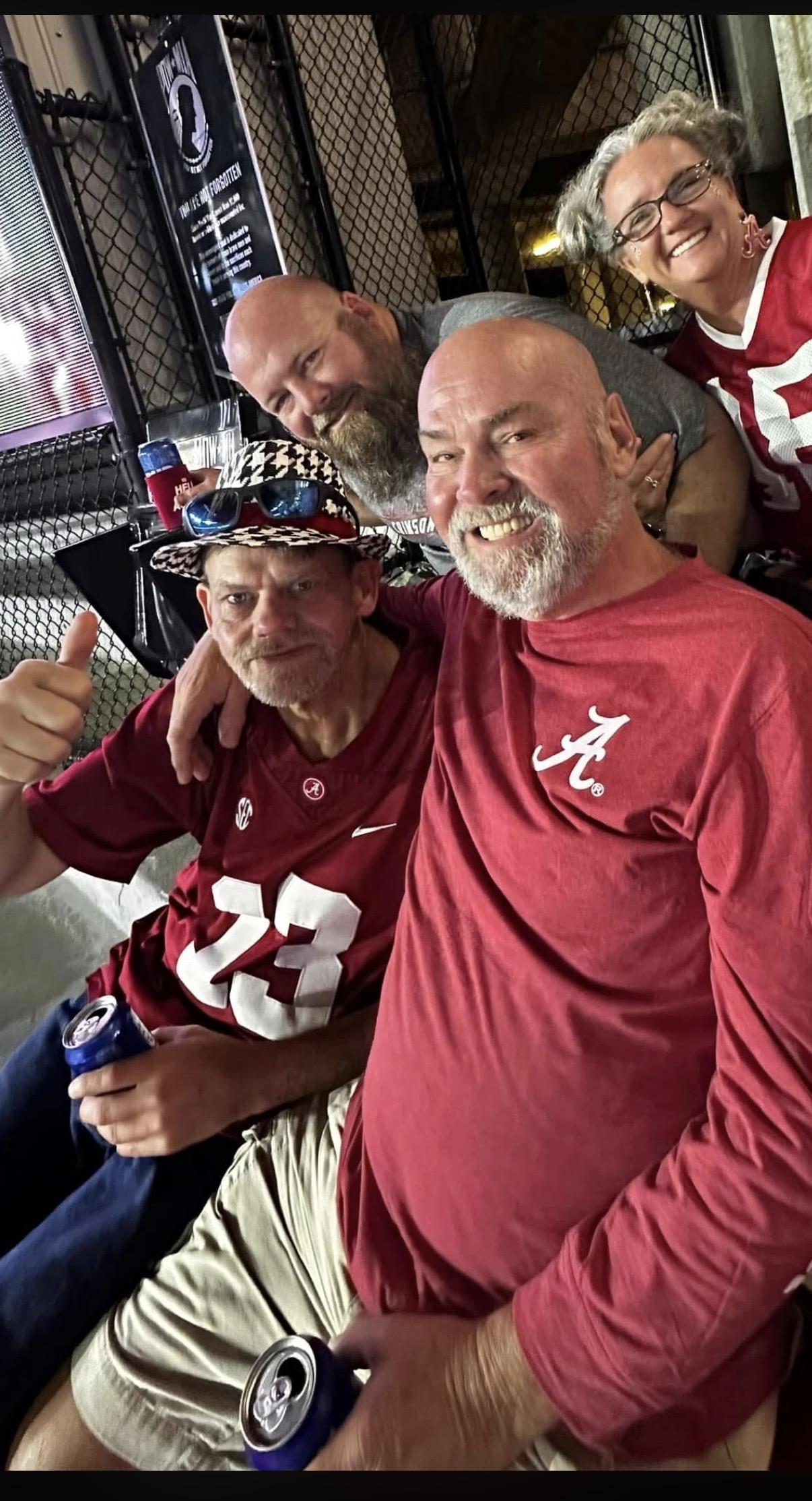A group of men posing for a picture