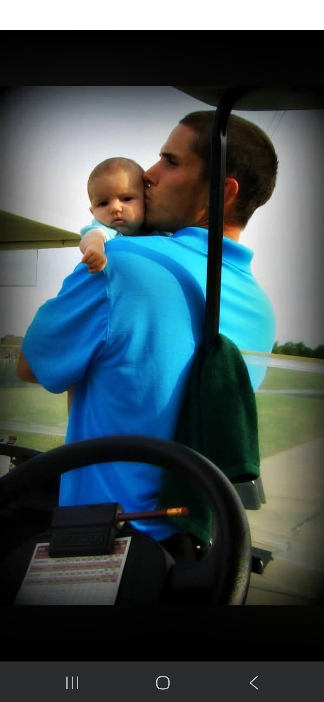 A man holding a baby