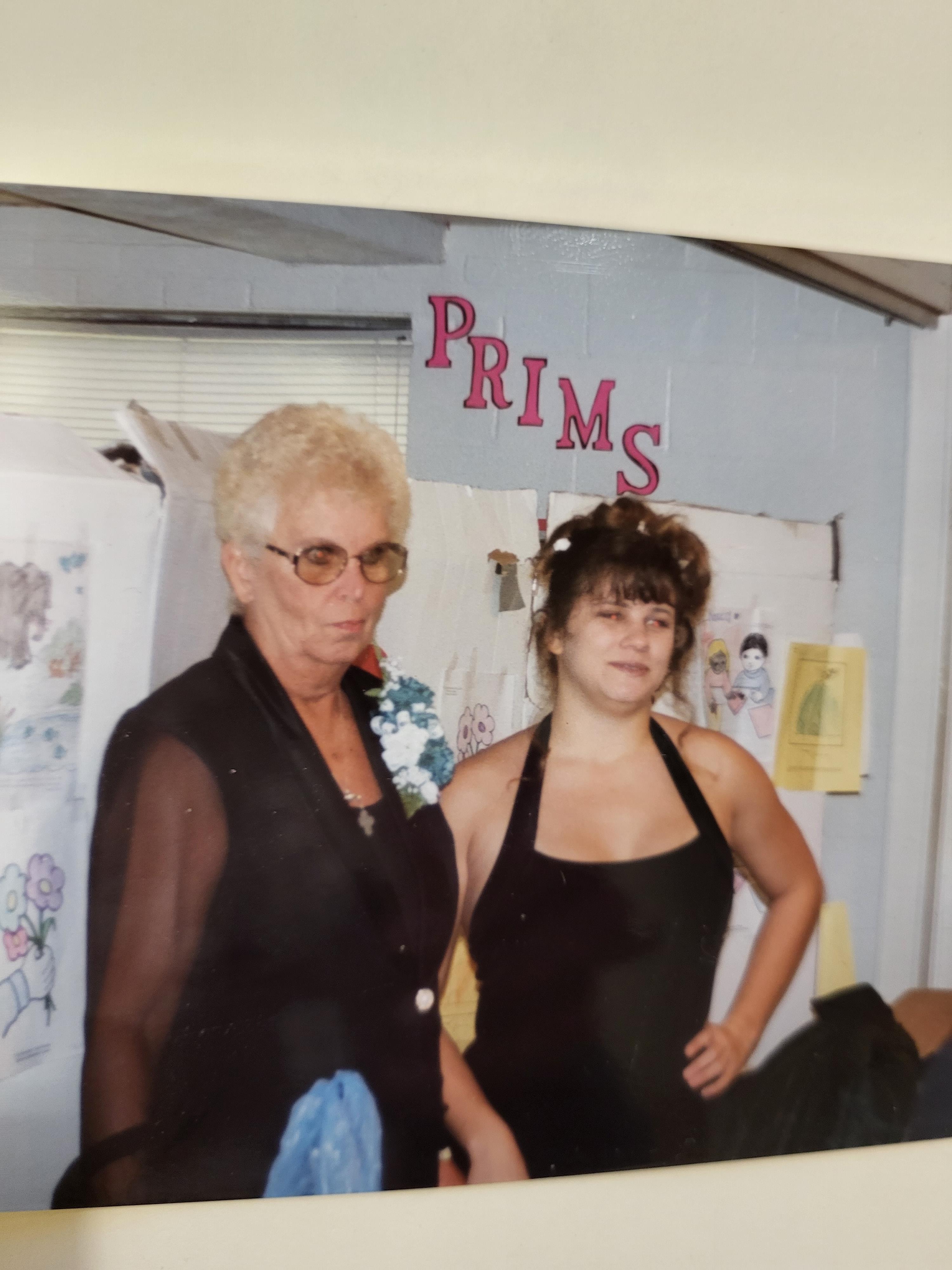 Two women standing in a room