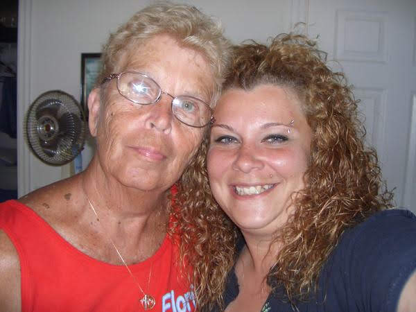A woman and a woman smiling