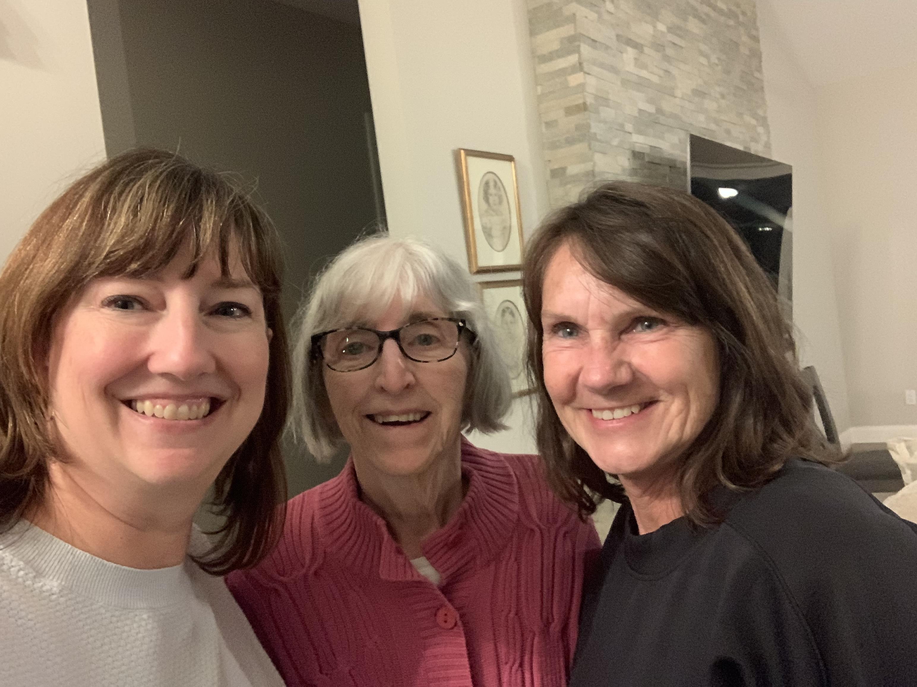 A group of women smiling for a selfie