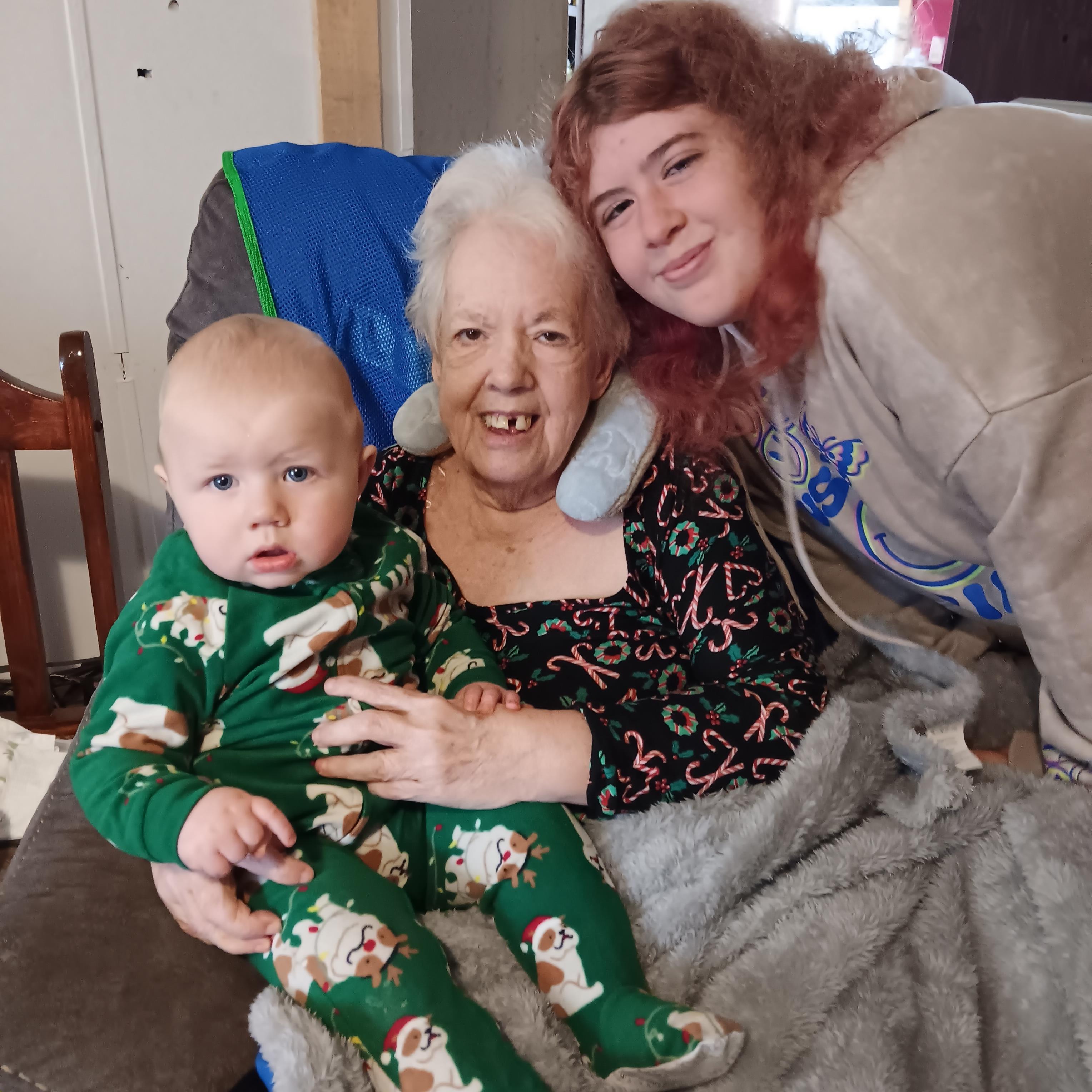 A woman and a baby posing for a picture
