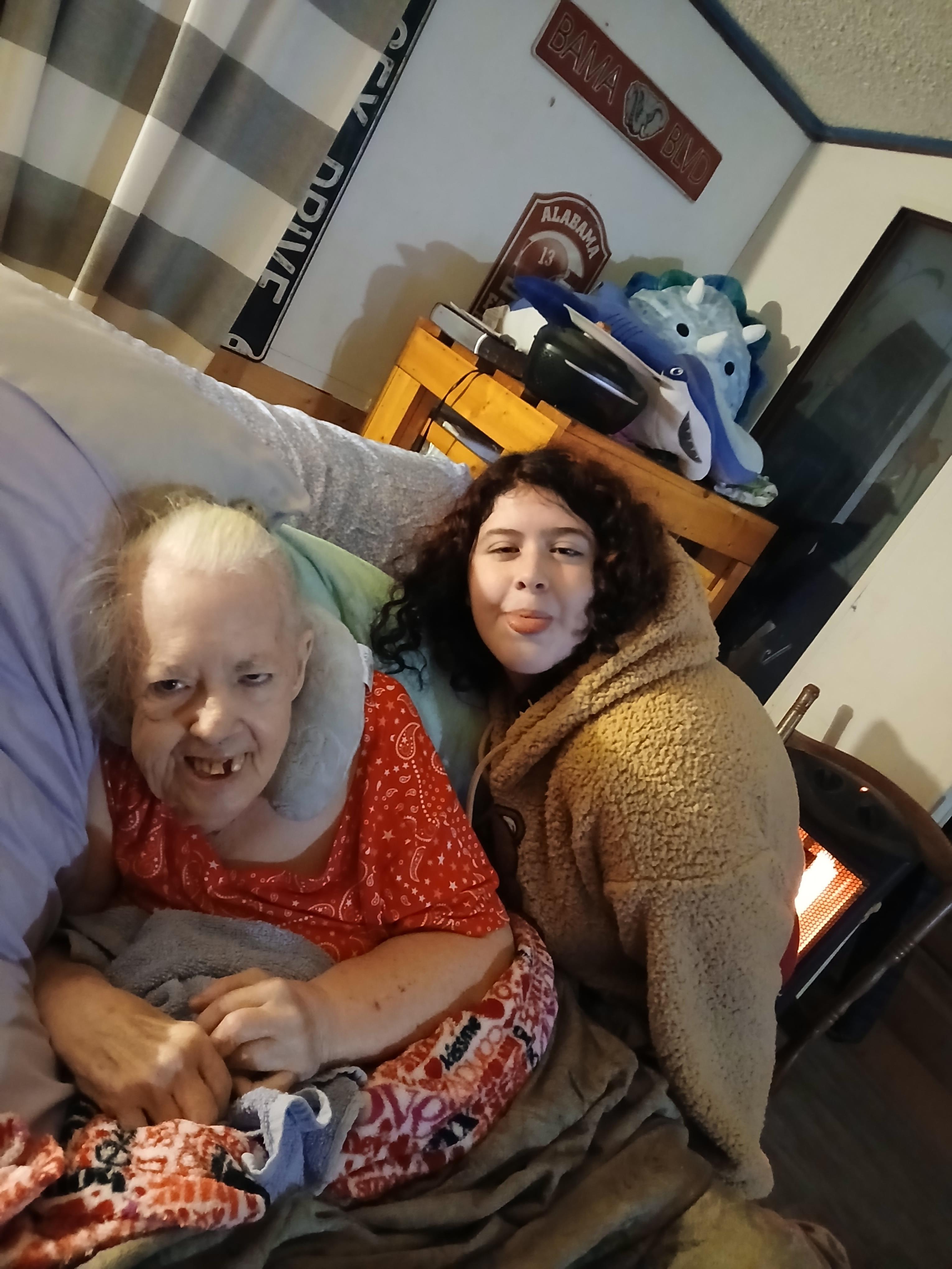 Two women sitting on a couch