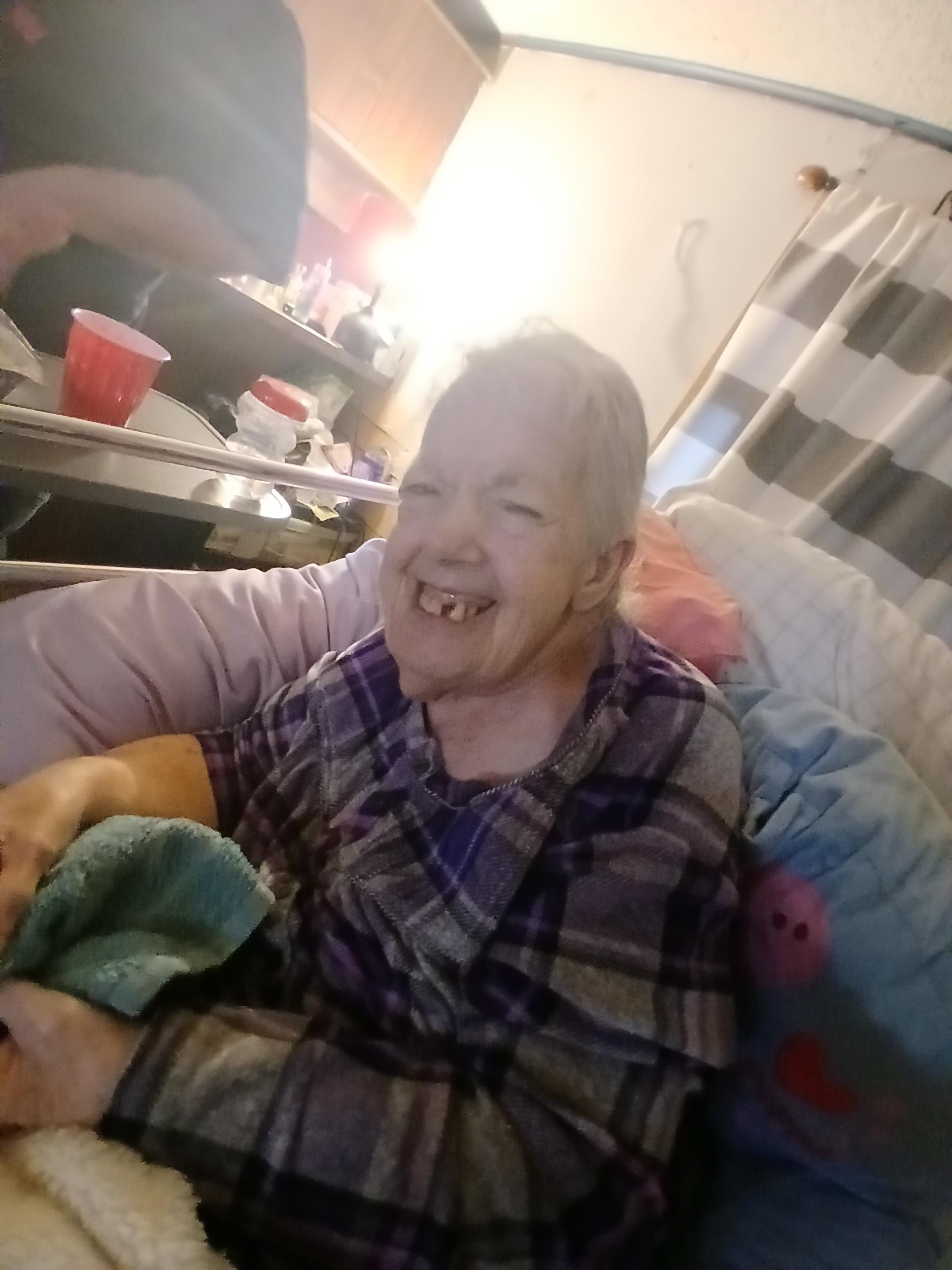 A woman in a hospital bed