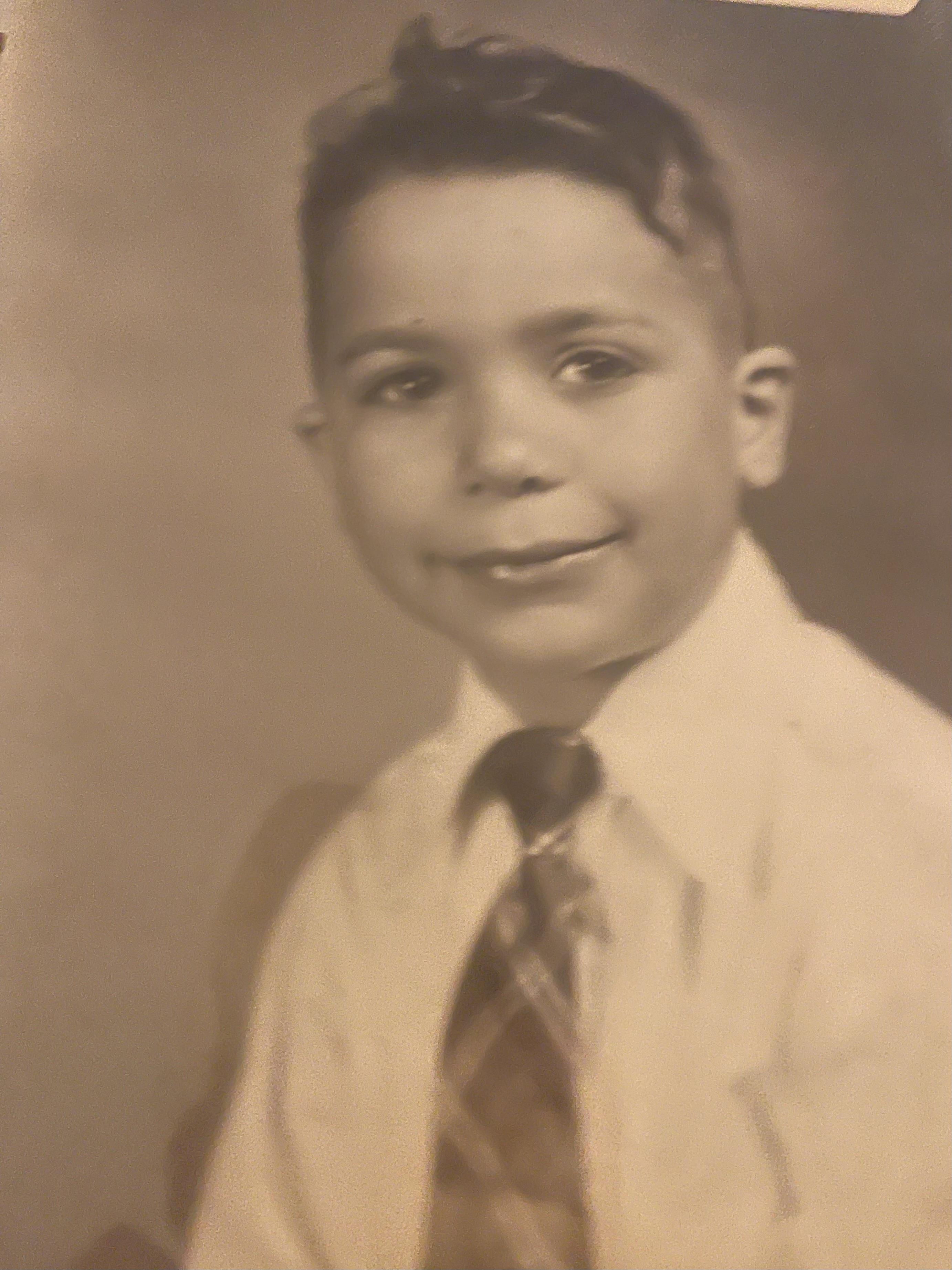 A boy in a tie