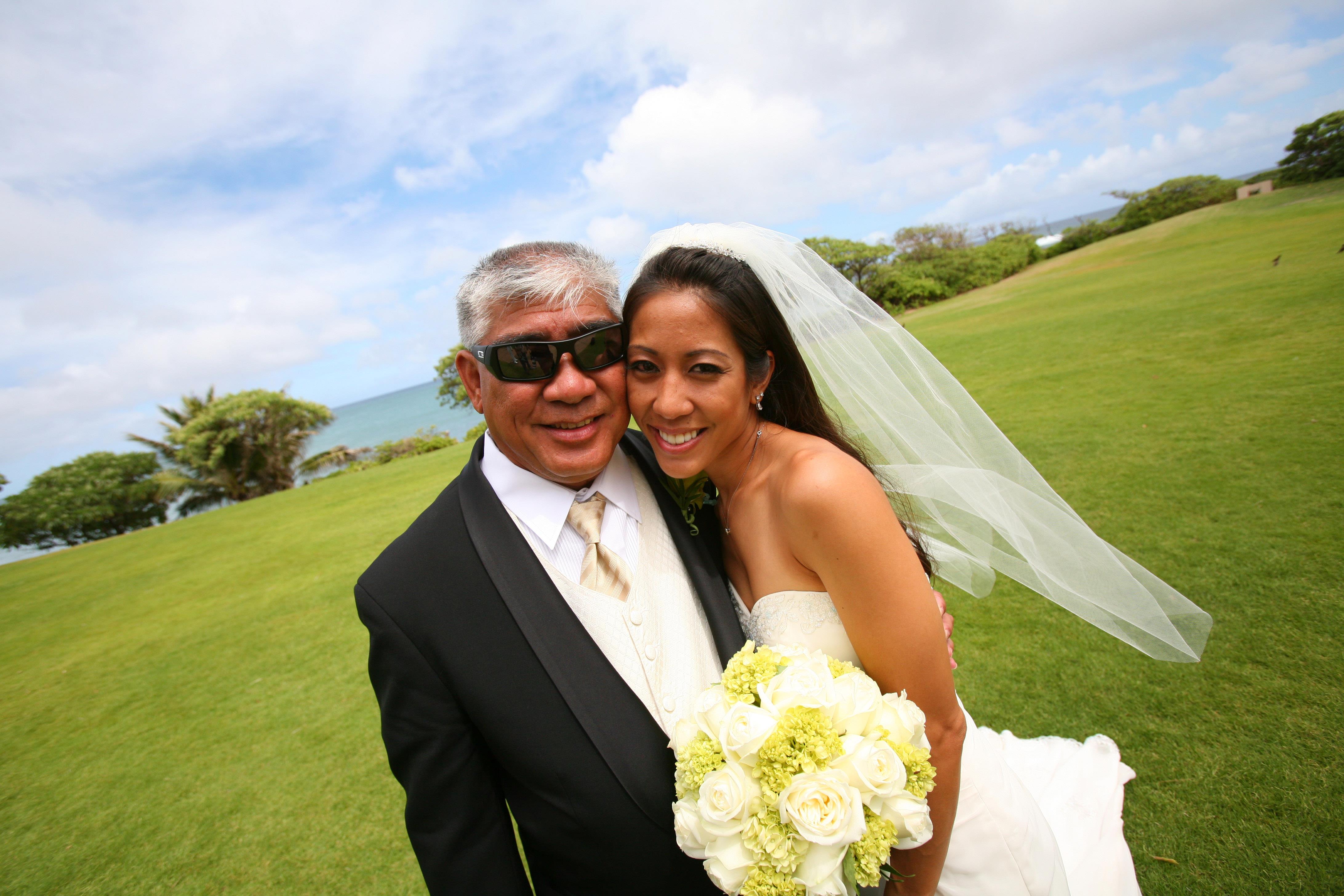 A man and woman posing for a picture