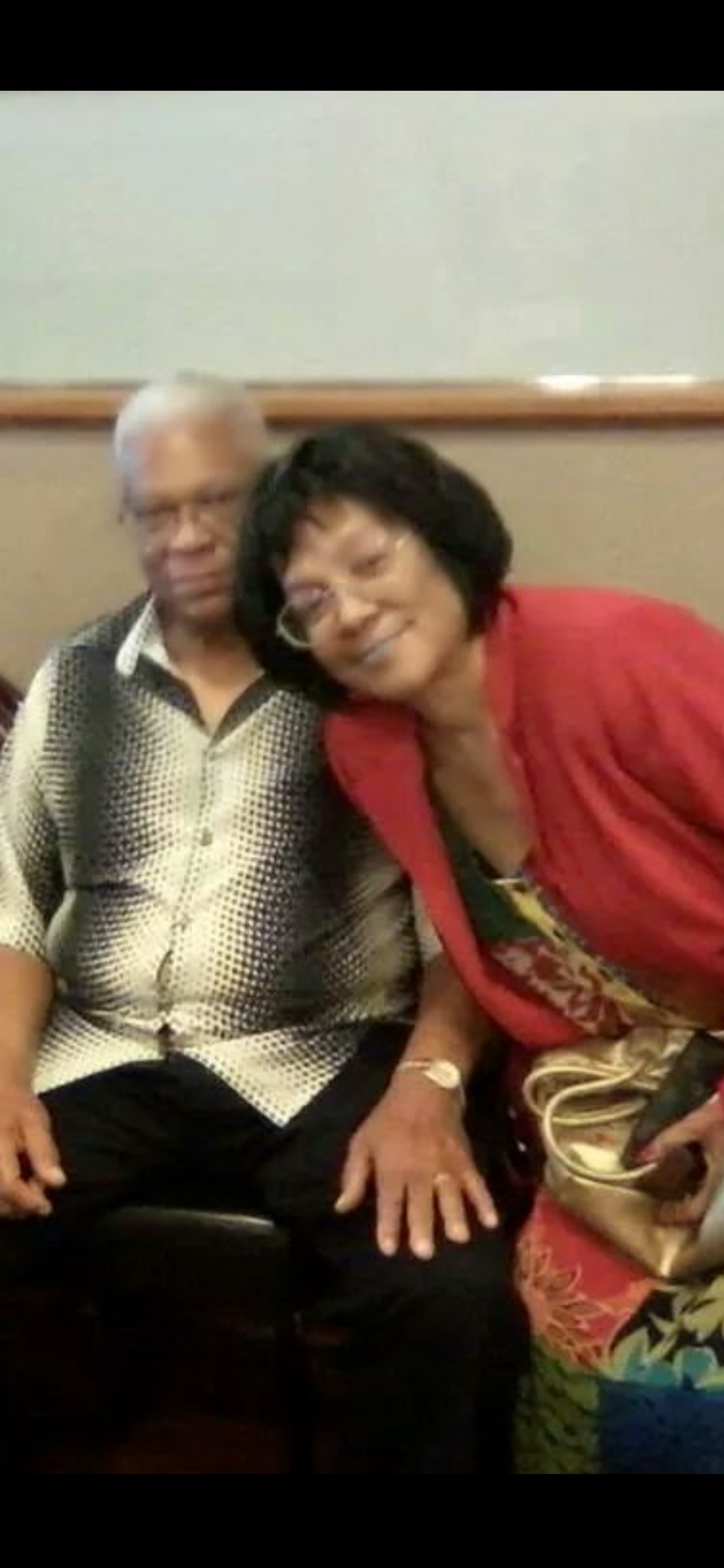 A man and woman sitting together
