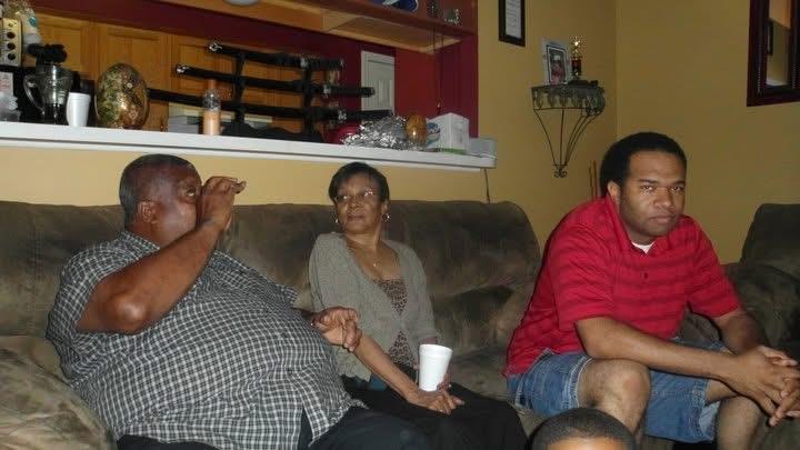 A group of people sitting on a couch