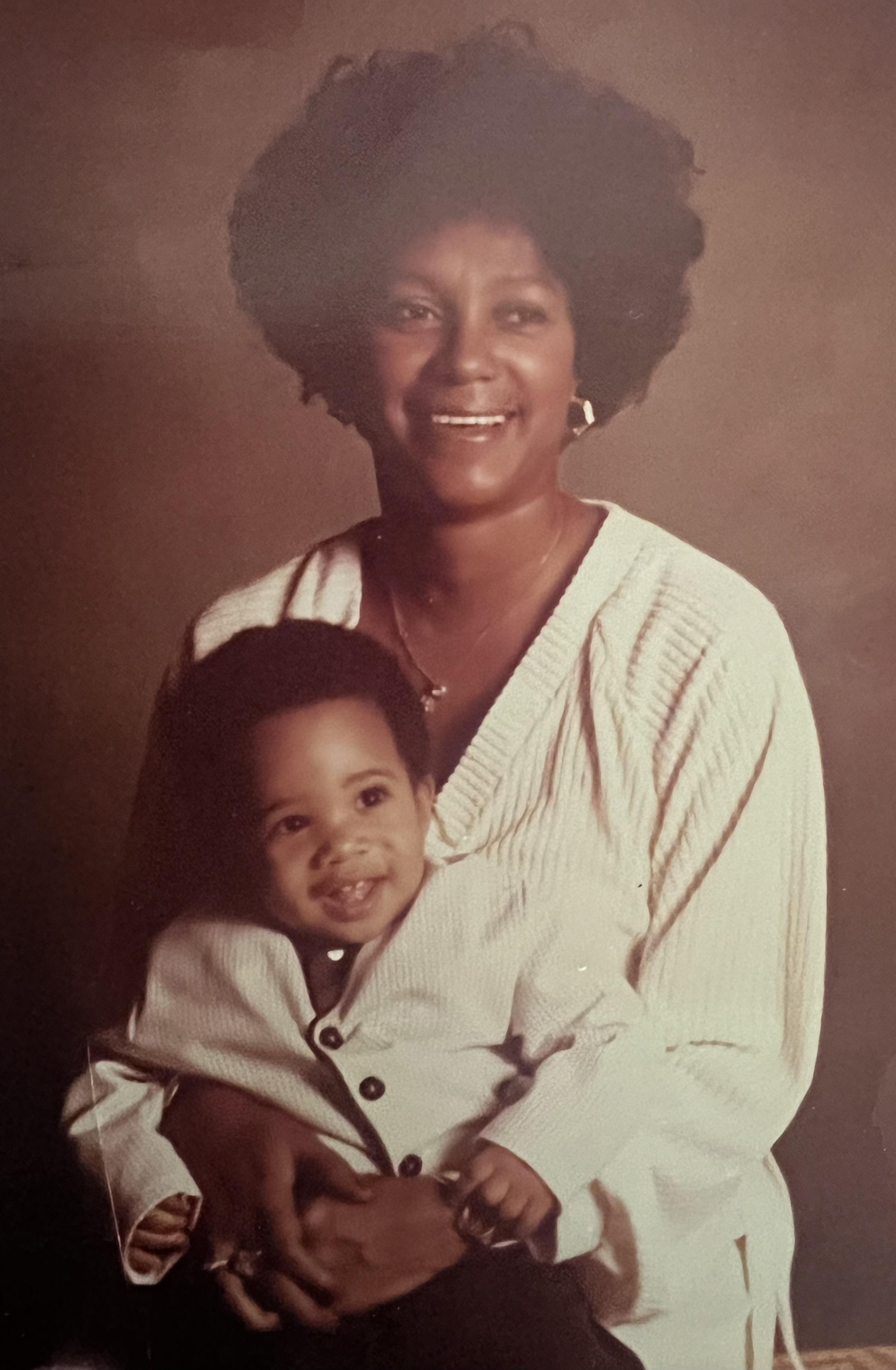A woman holding a baby