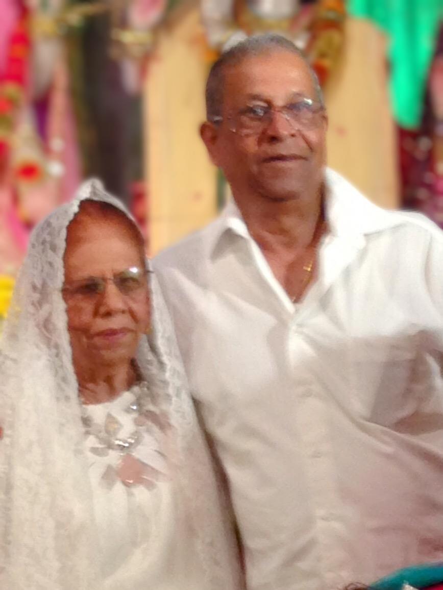 A man and woman in white