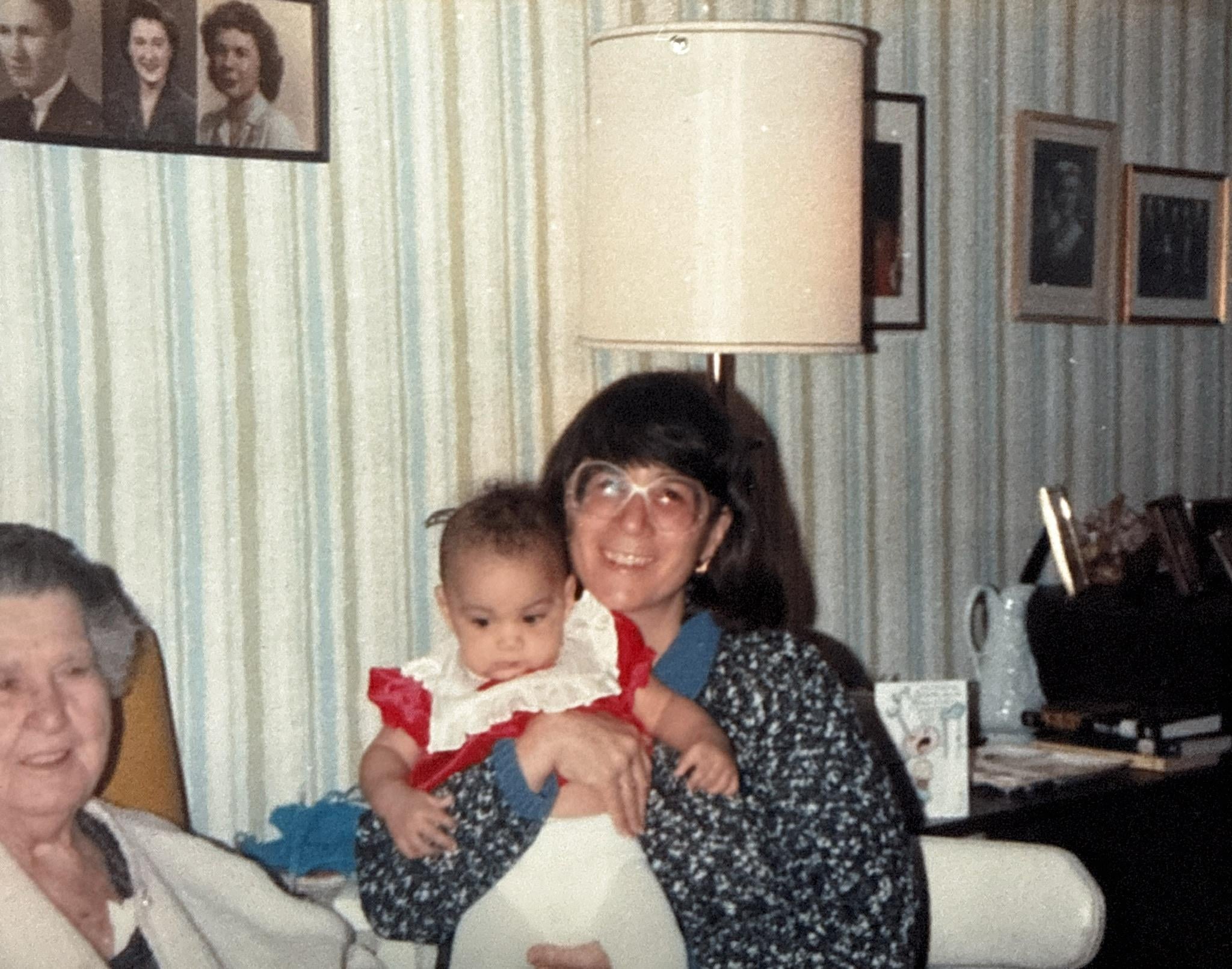 A woman holding a baby