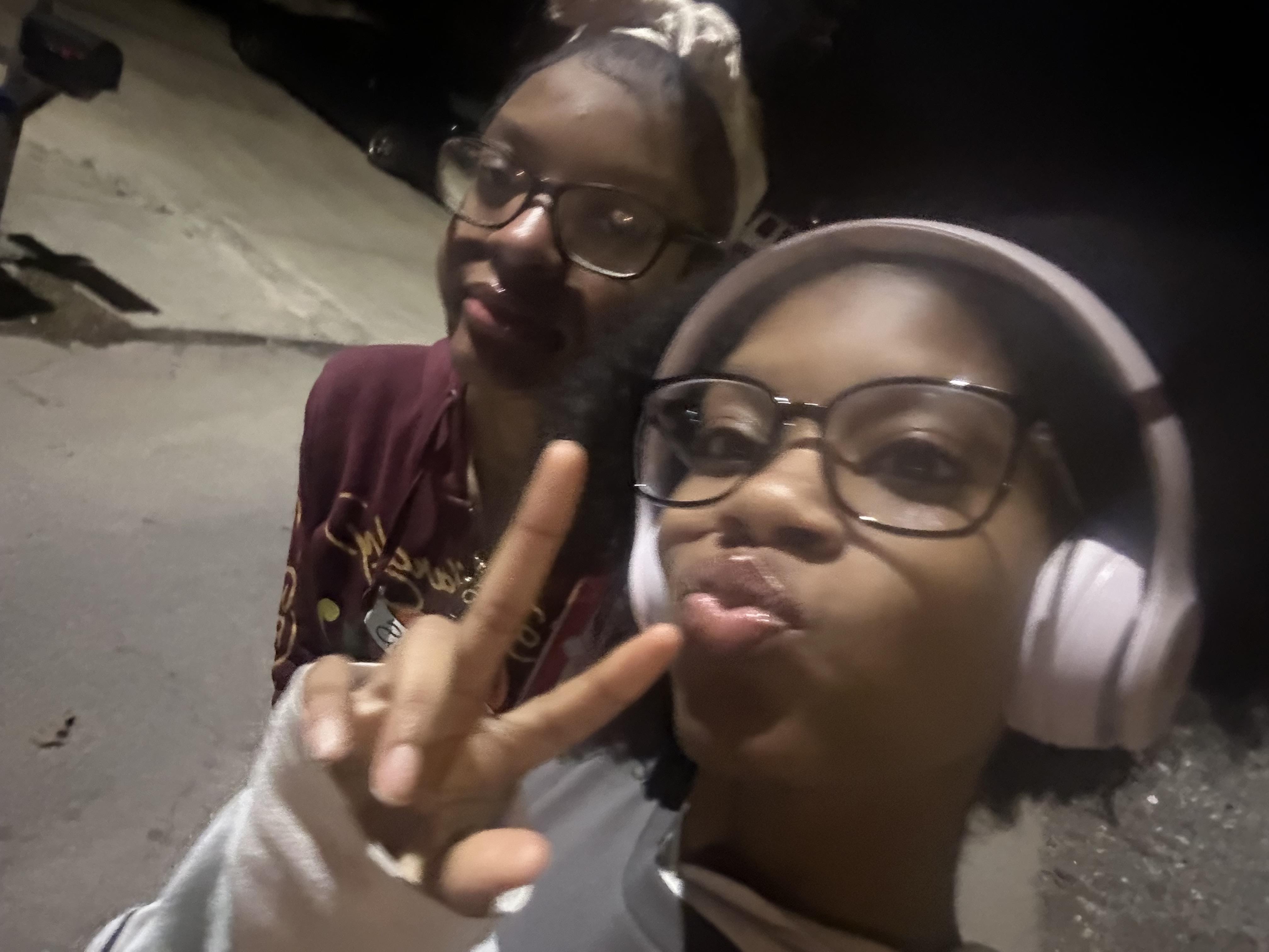A couple of people taking a selfie