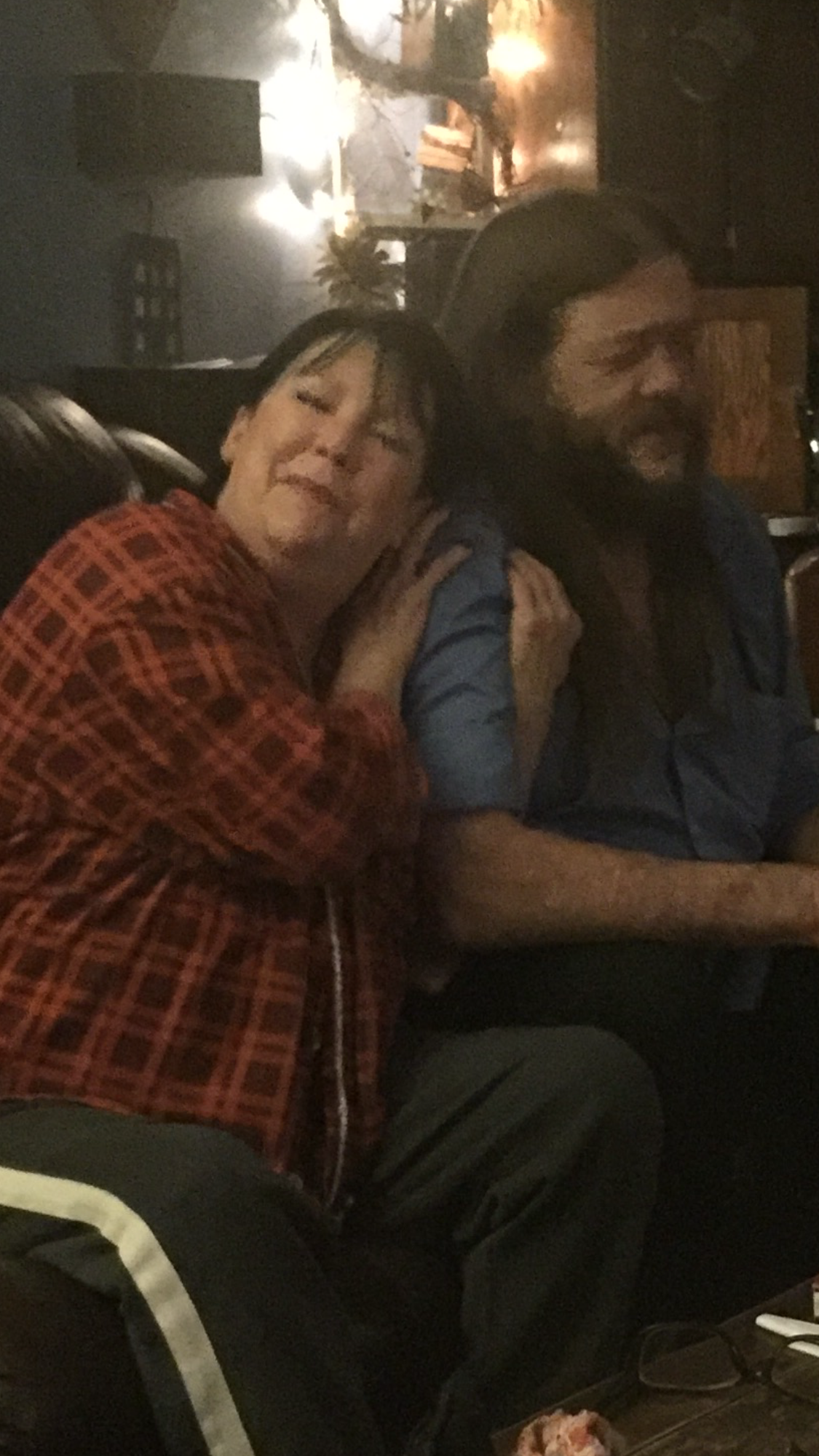 A woman sitting next to a man