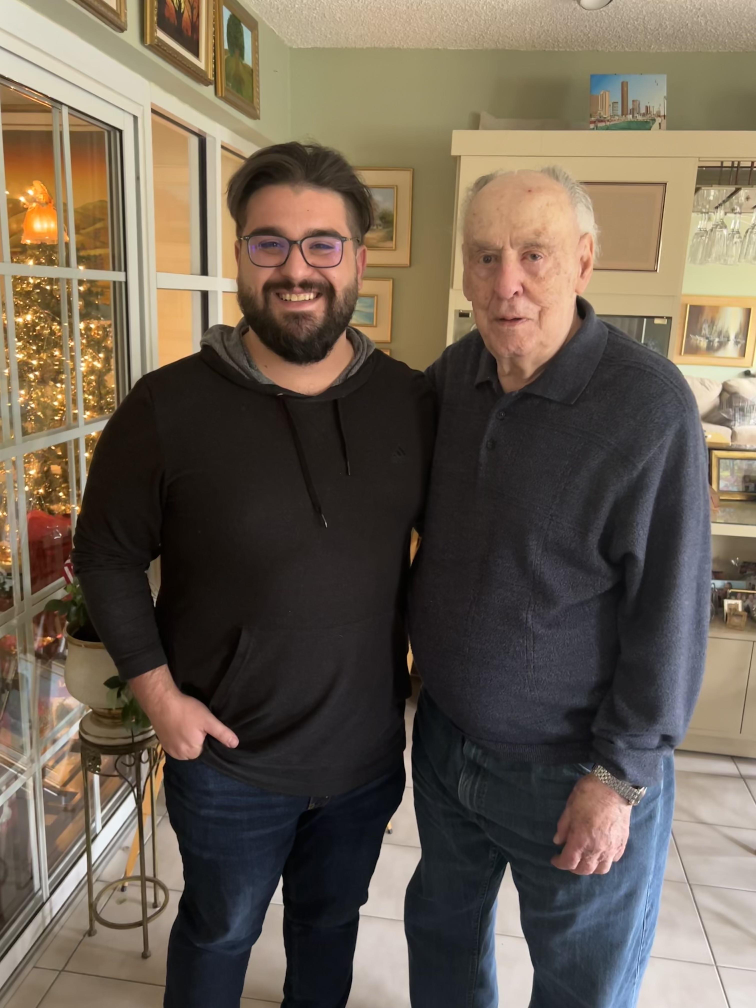 Two men standing next to each other