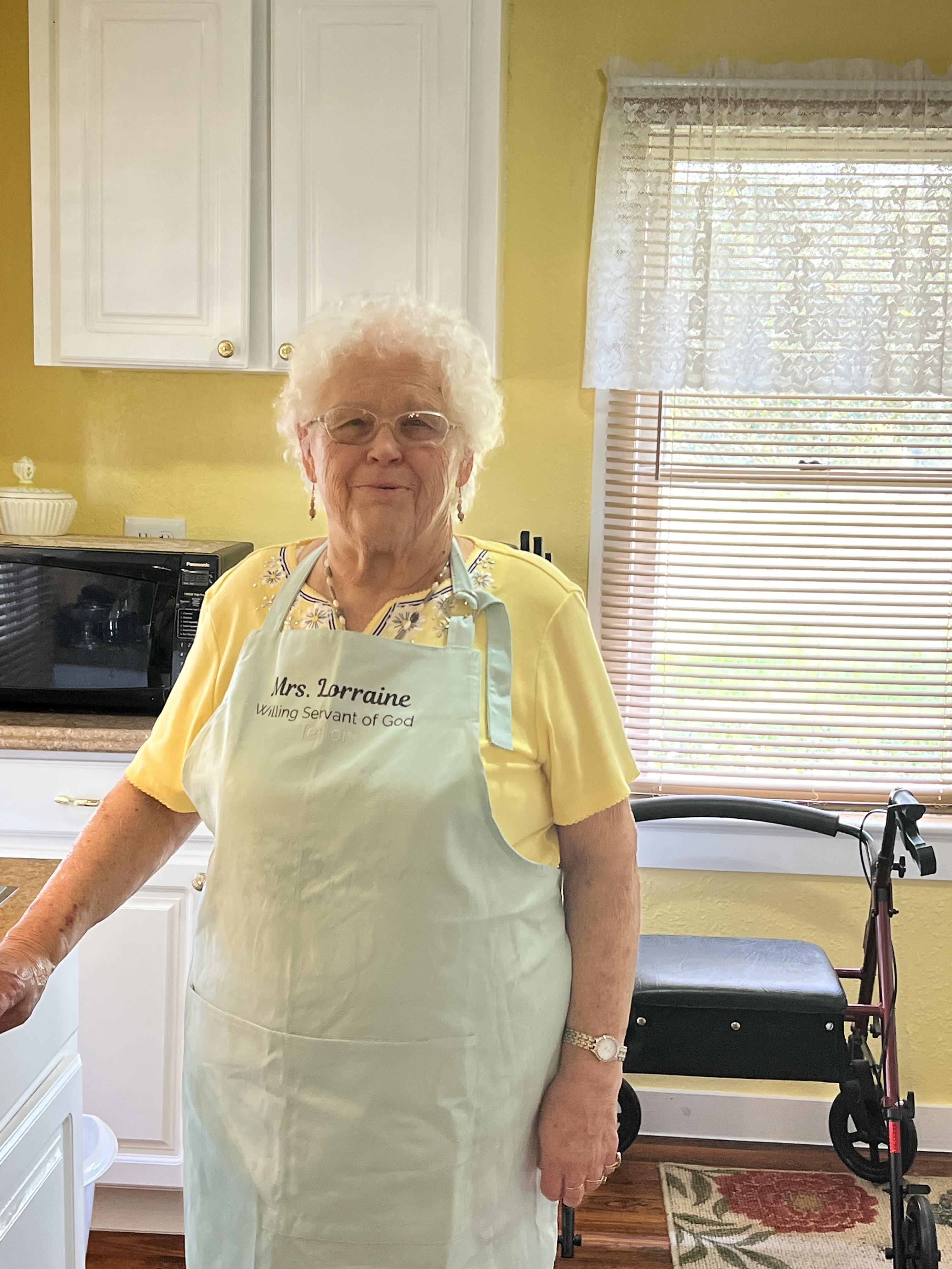 An old woman in a kitchen