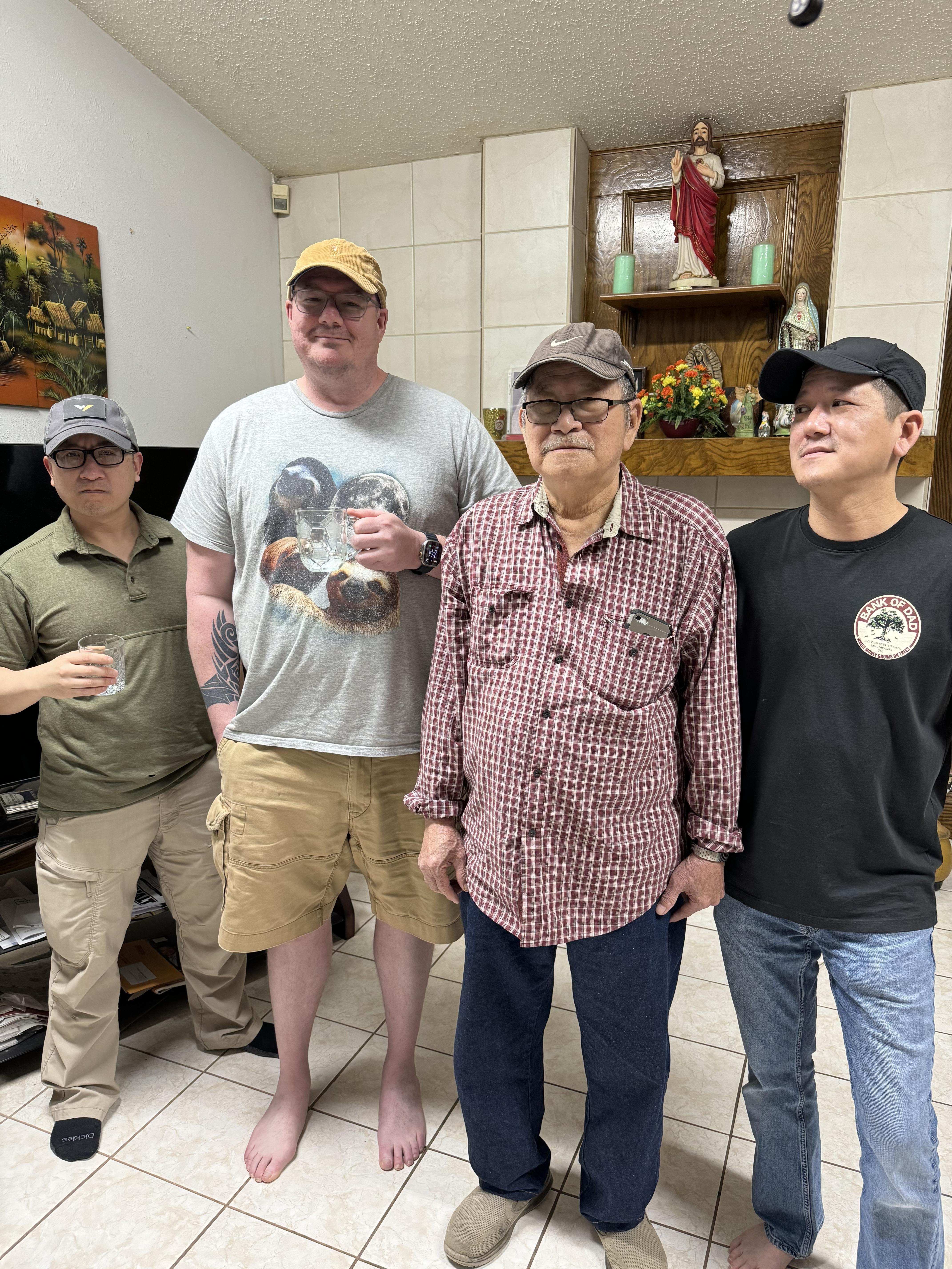 A group of men standing in a room