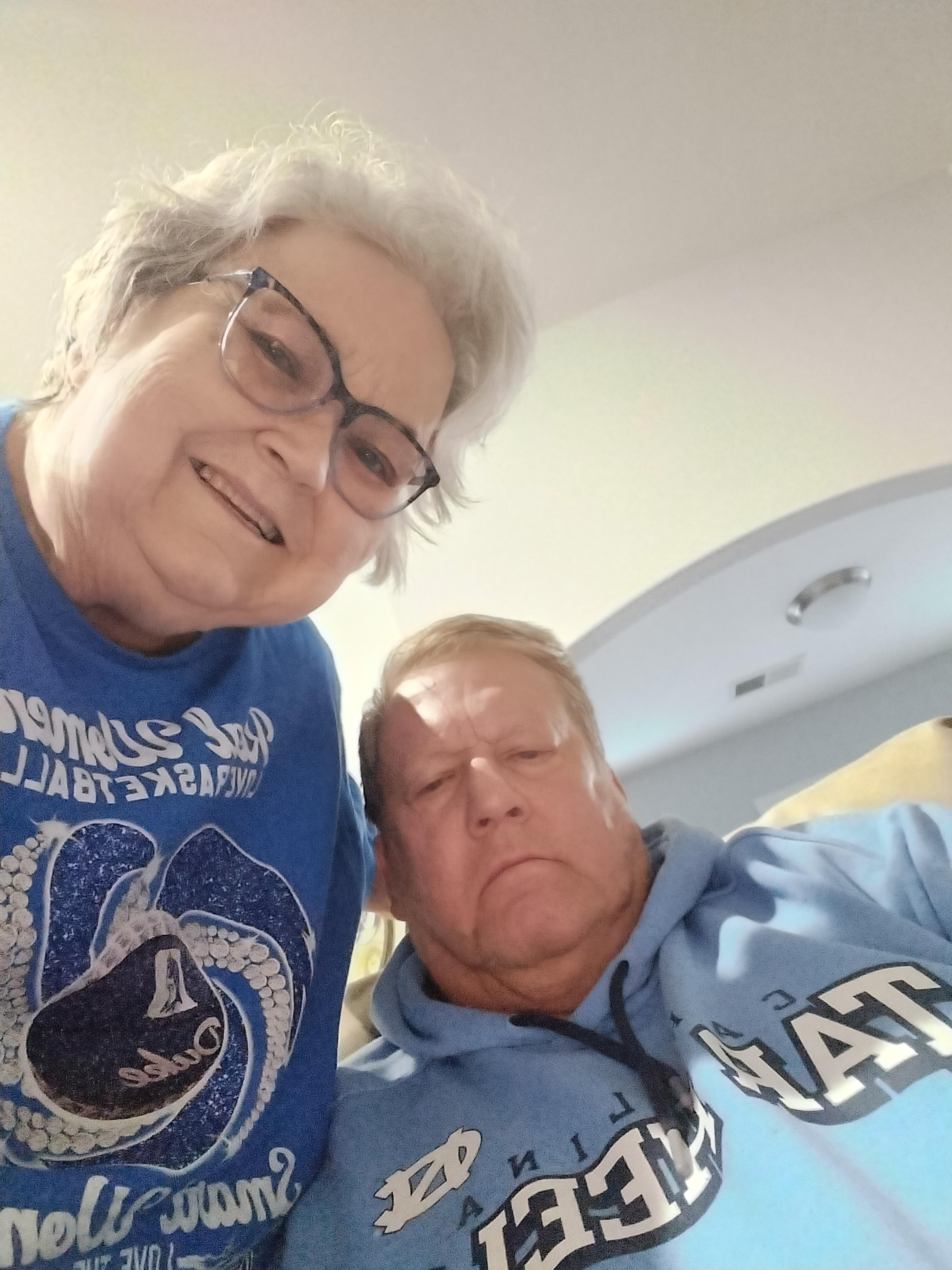 A man and woman taking a selfie