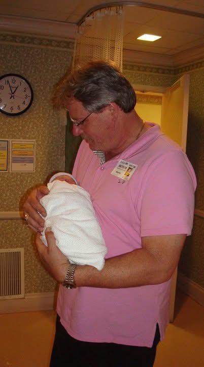 A man holding a baby
