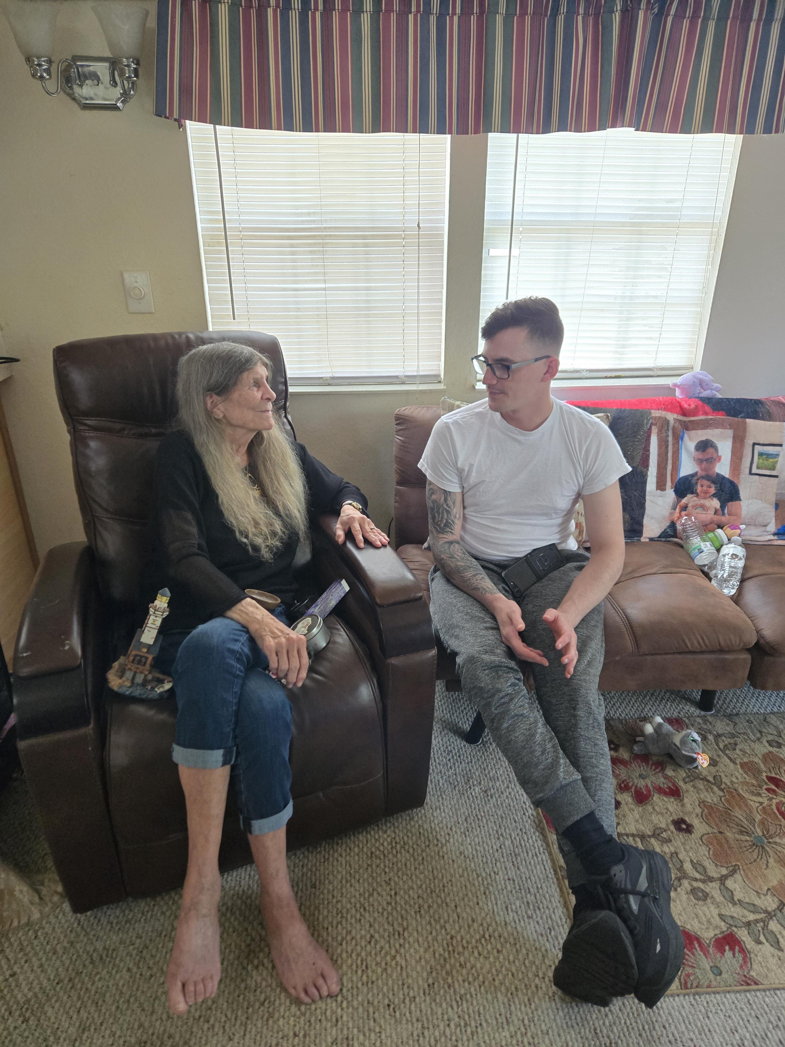A man and woman sitting in chairs