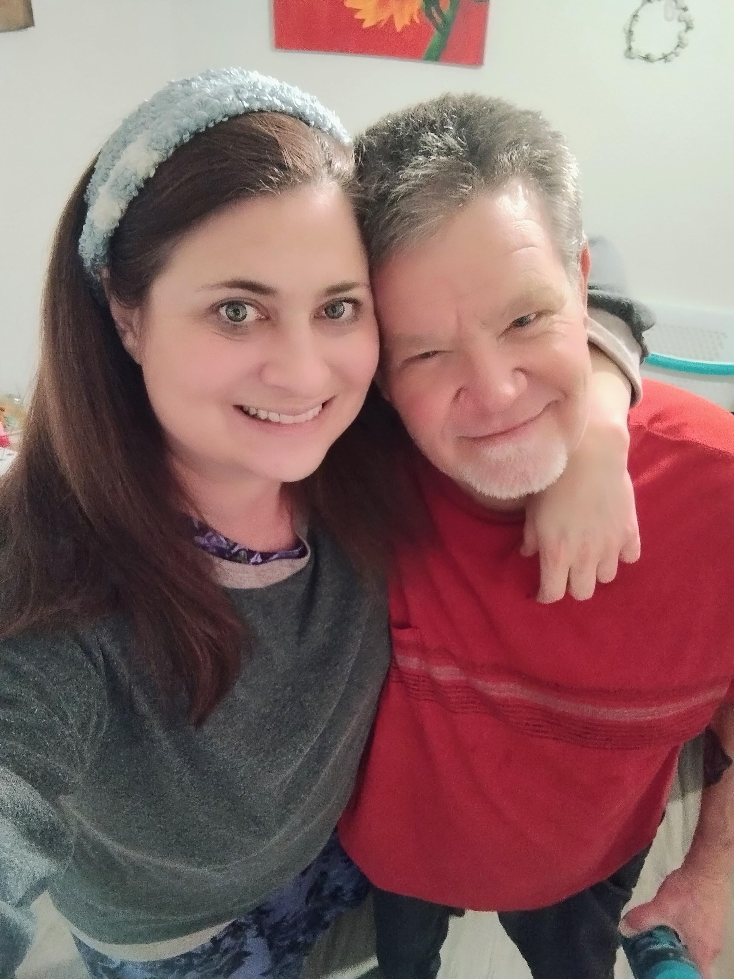 A man and woman taking a selfie