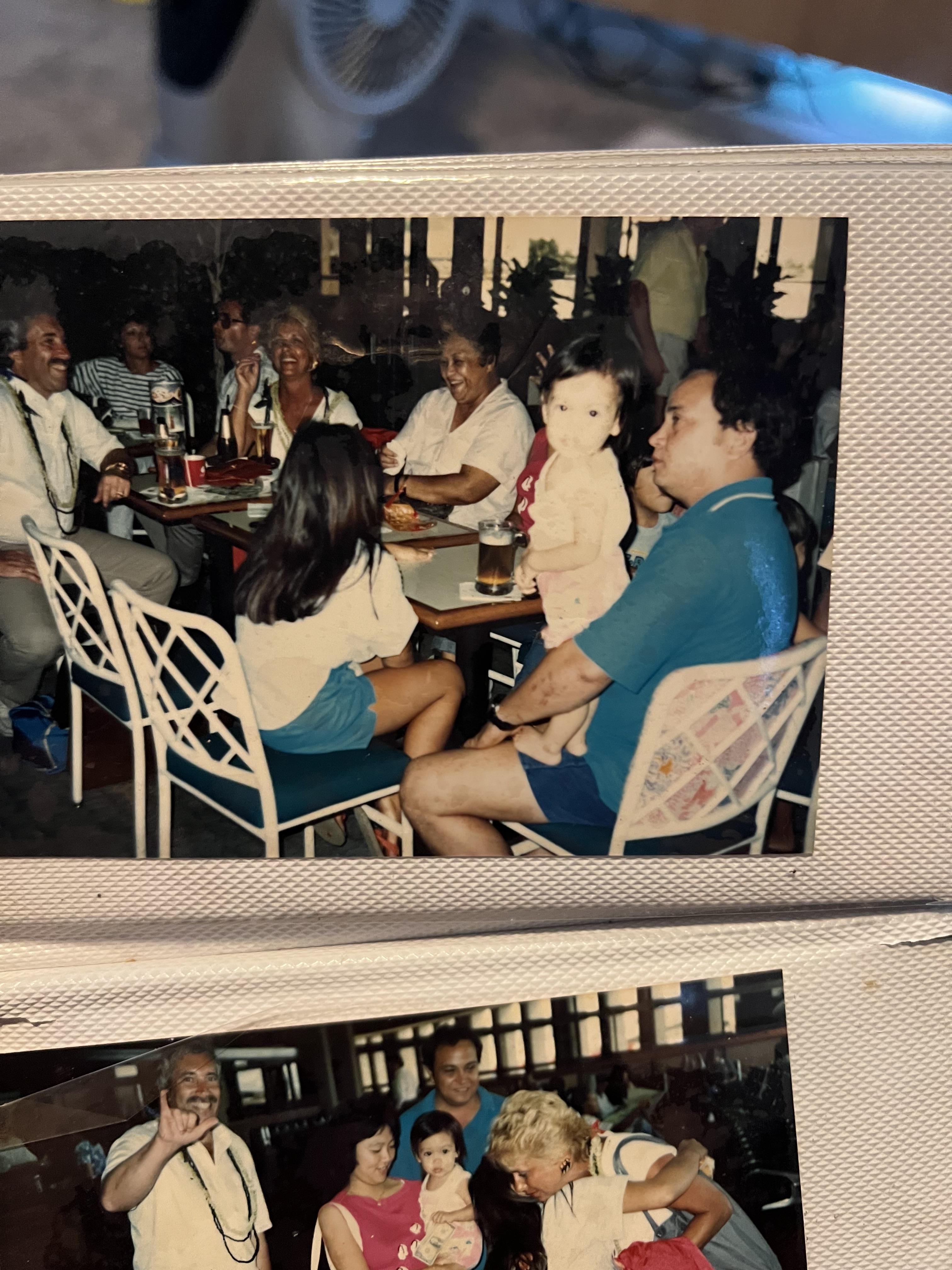 A group of people sitting at tables