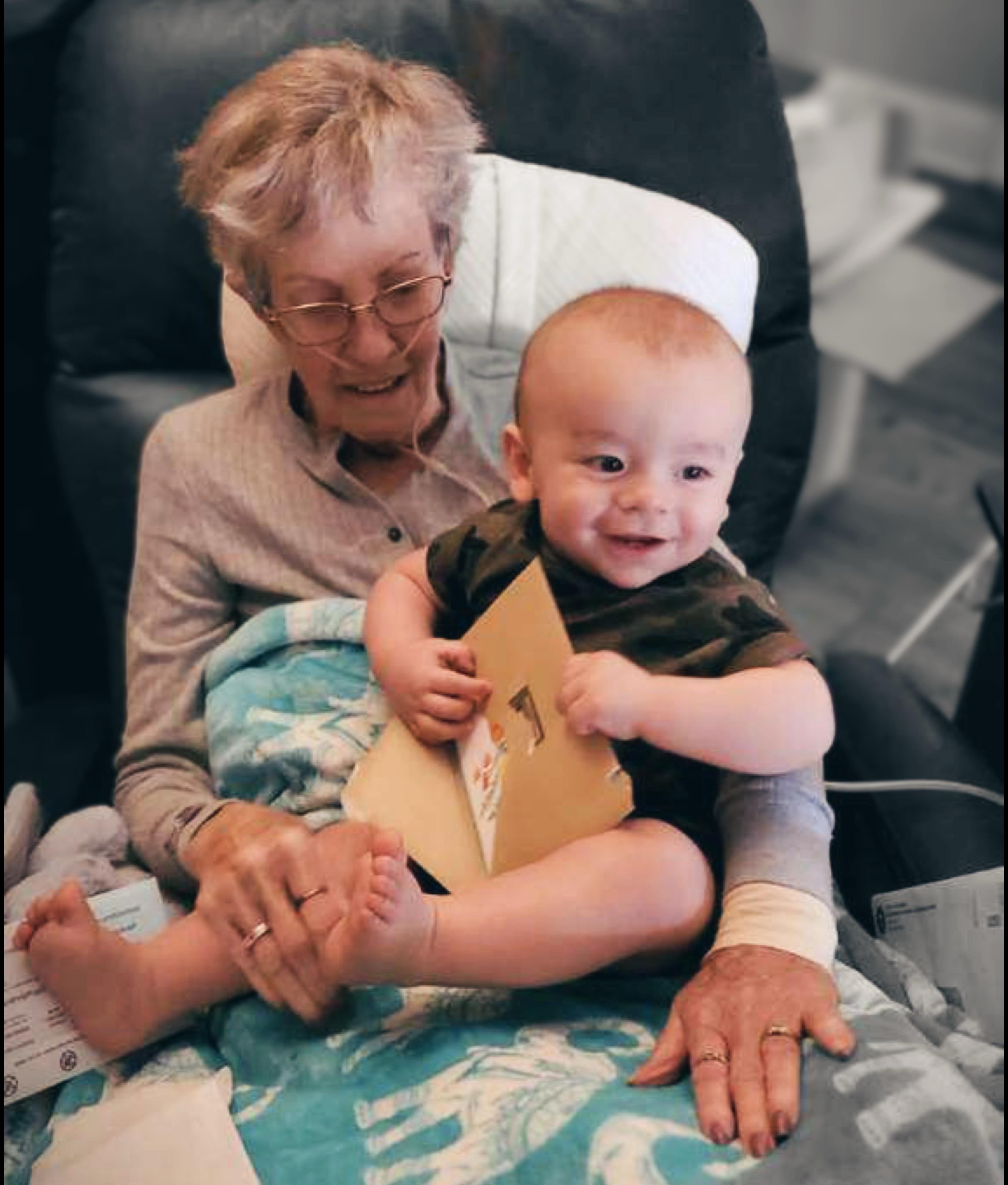 A woman holding a baby