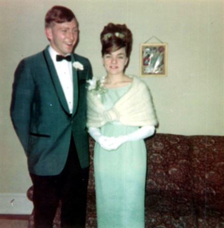 A man and woman standing next to each other