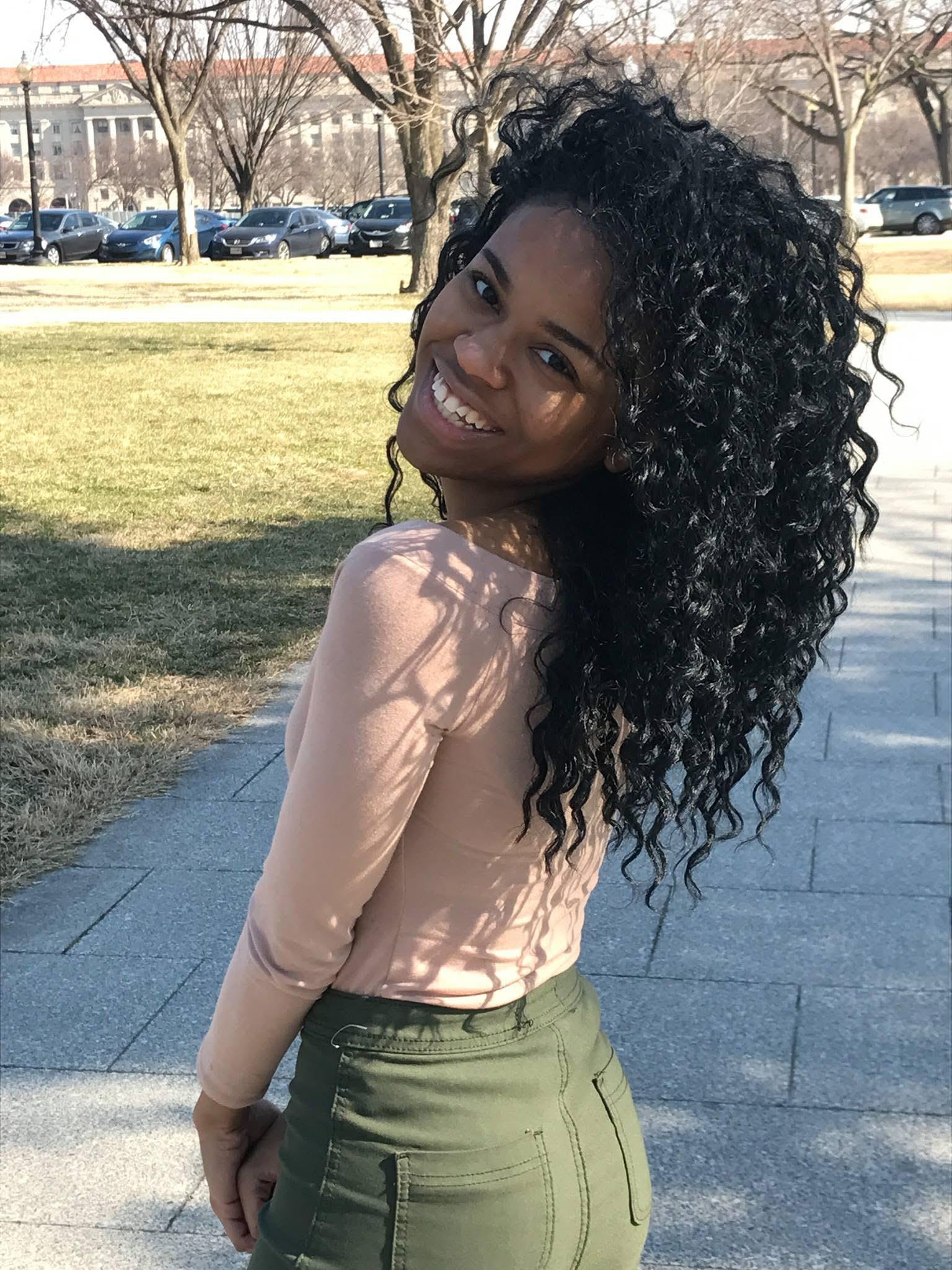 A woman smiling at the camera