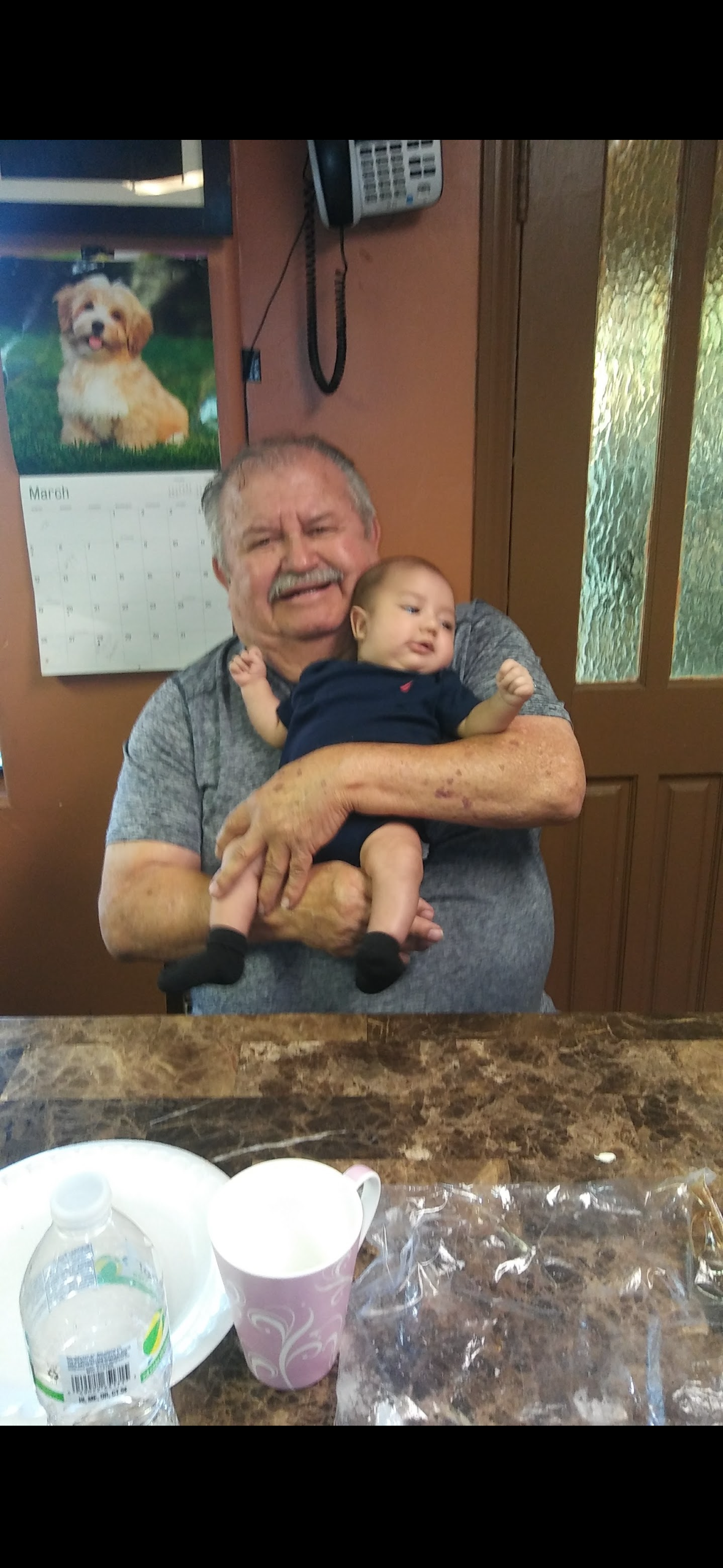 A man holding a baby