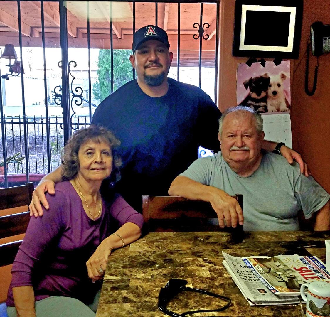 A group of people sitting at a table