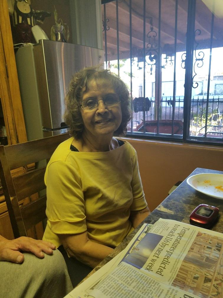 A woman sitting at a table