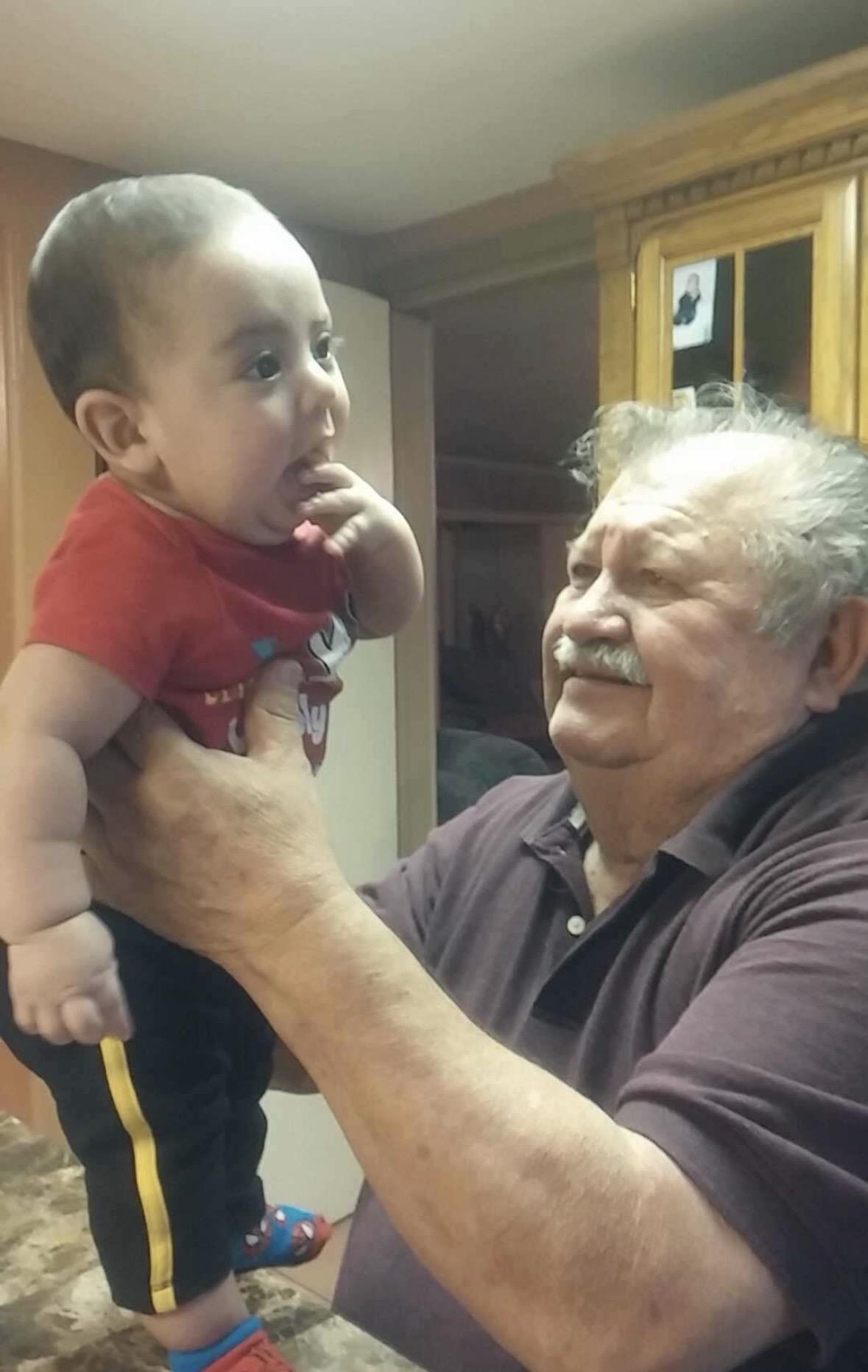 A man holding a baby