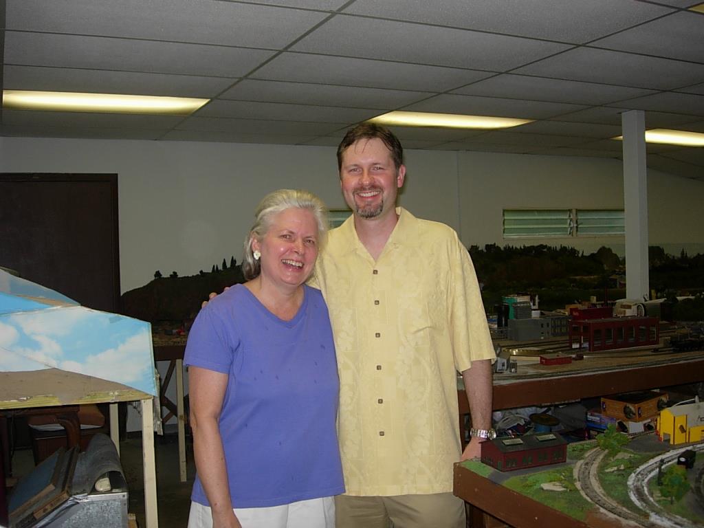 A man and woman standing next to each other