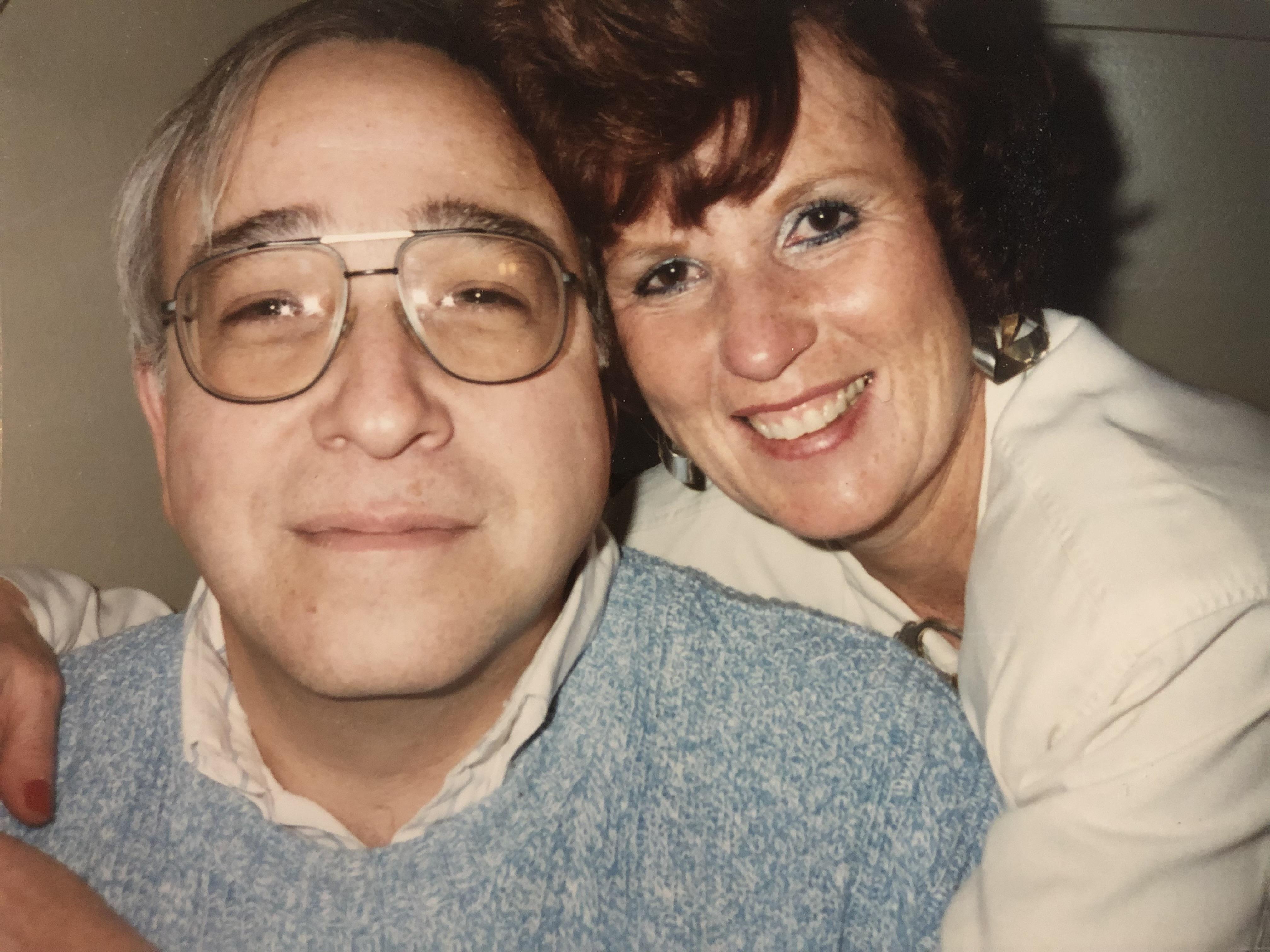 A man and woman smiling for a picture