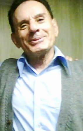A man in a blue shirt