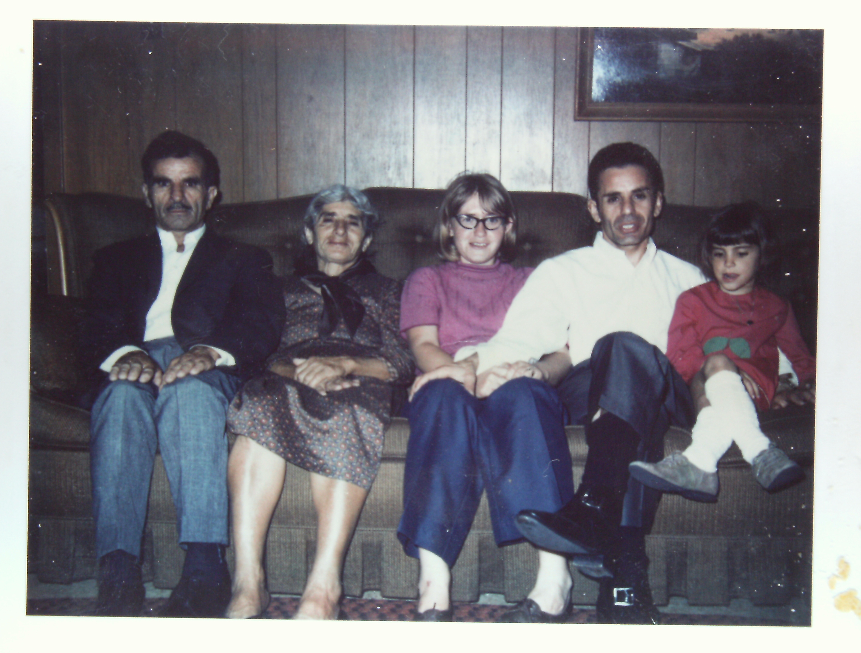 A group of people sitting on a couch