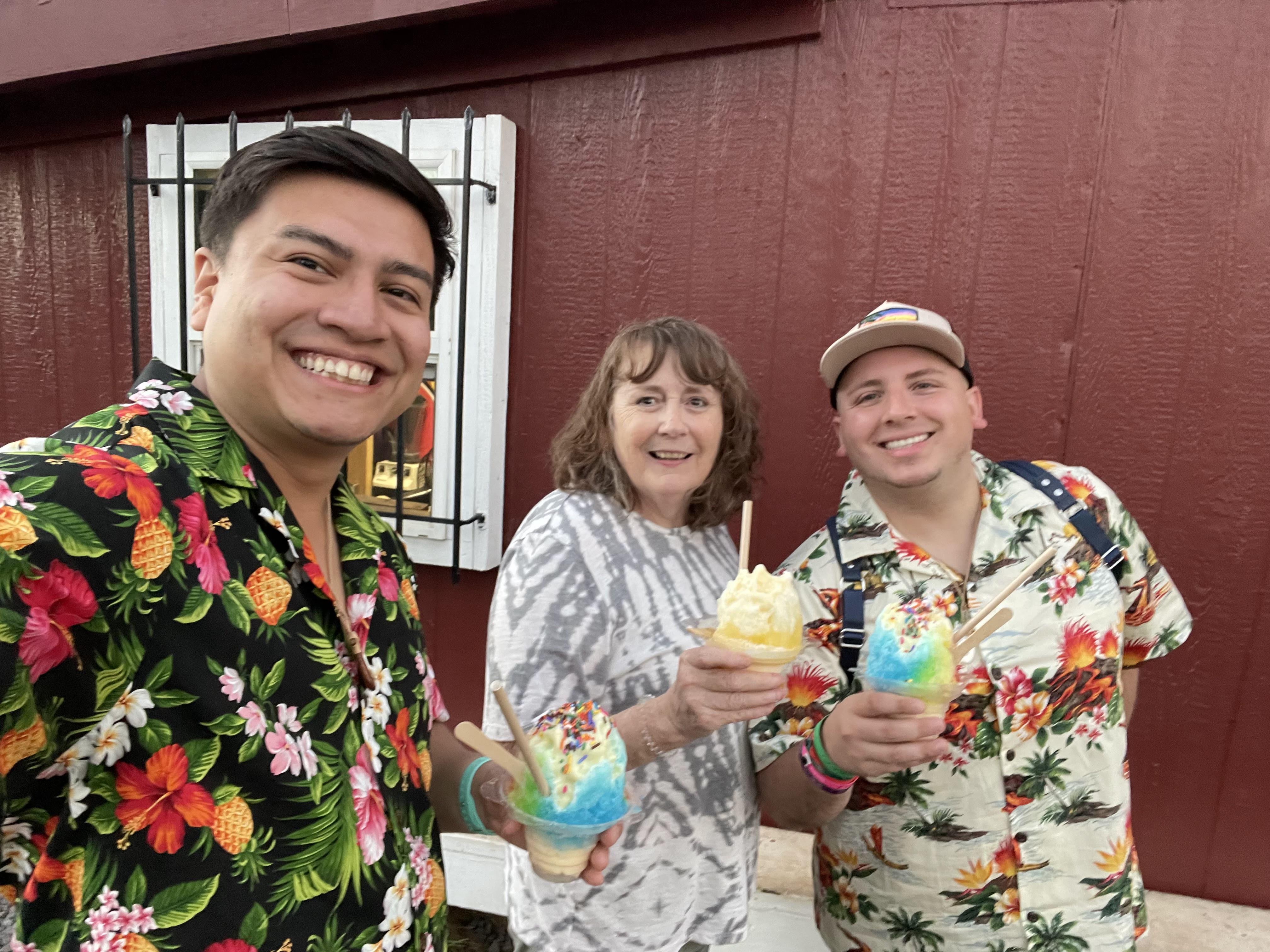 A group of people holding ice cream
