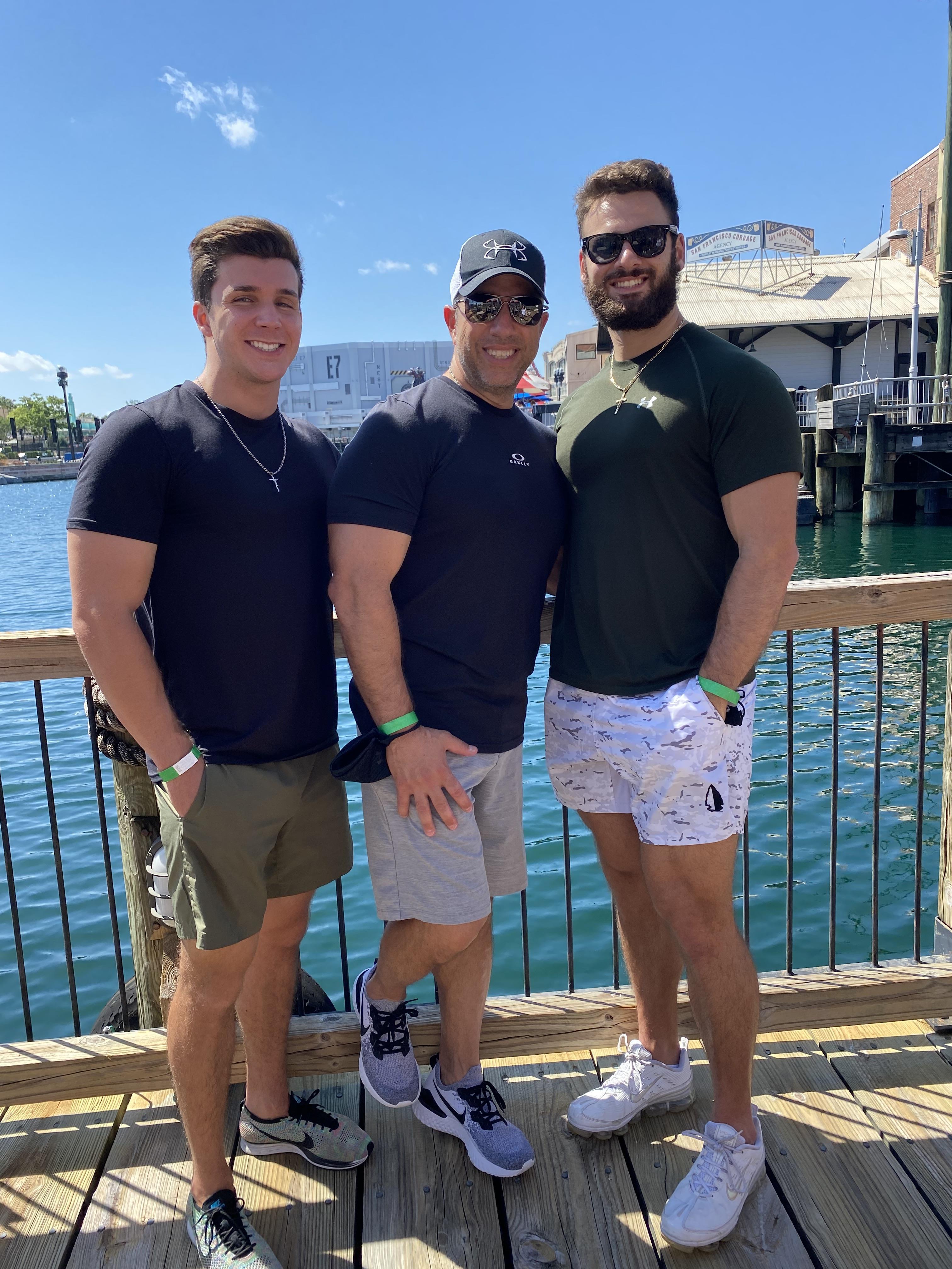A group of men posing for a picture
