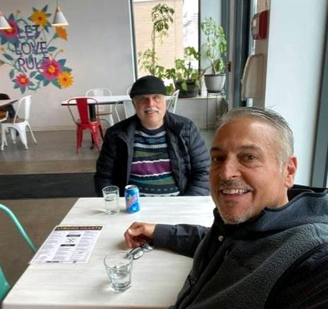 Two men sitting at a table