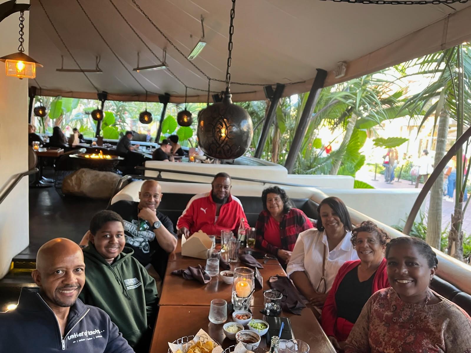 A group of people sitting at a table