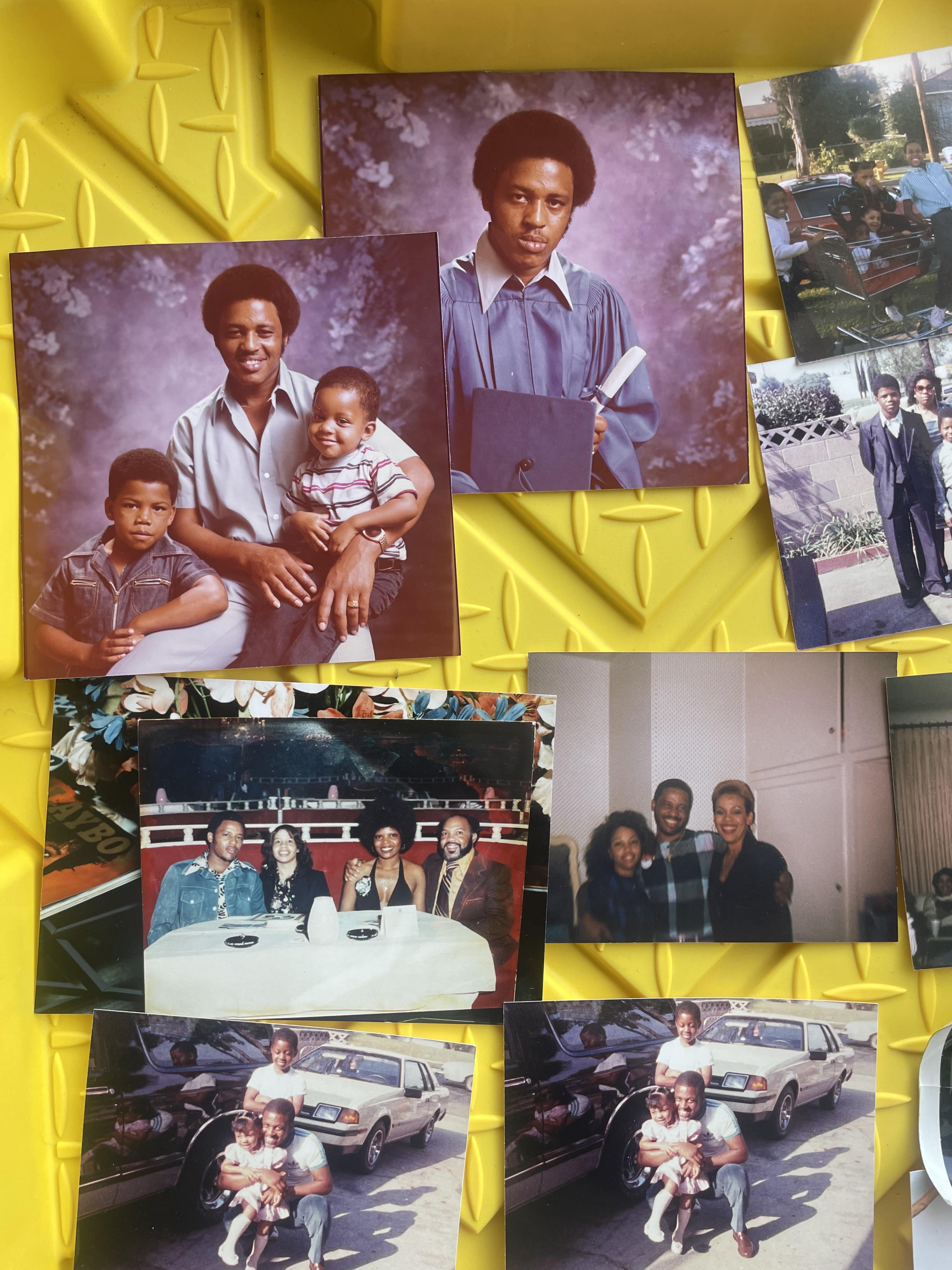 A group of photos on a yellow surface